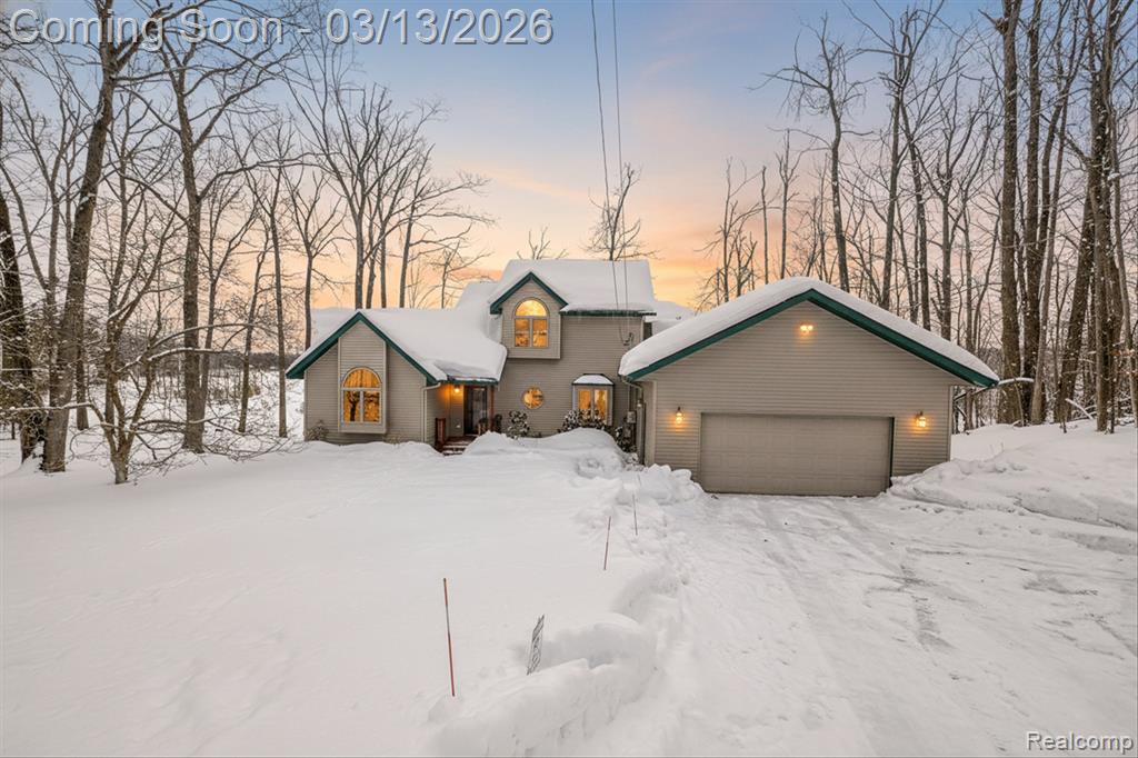 **OPEN HOUSE ON SATURDAY, 3/14 12-2 PM** Welcome to 4397 E Vail Lane in Gaylord, a true lakefront getaway on the quiet waters of Perch Lake.This 5-bedroom, 3.5-bath home offers plenty of space for family, friends, and guests. The layout is set up well for hosting, relaxing, and enjoying everything Northern Michigan has to offer all year round.The main-level primary suite includes a private bathroom with a standup shower and jetted tub, along with its own balcony overlooking the lake. It is a great spot to have coffee in the morning or unwind in the evening. Currently the home includes three additional large bedrooms with queen beds, and another large upstairs bedroom which includes two full beds, making it ideal for larger groups. There is also a cozy den with a fireplace that adds extra living space and flexibility.The lower level is designed for entertaining, with a dedicated recreation area that makes it easy to gather after a day outside. Out back, a large deck wraps along the home and overlooks the yard and water. The backyard leads directly to your private beach frontage on Perch Lake, a peaceful non-wake lake that is perfect for kayaking, paddle boarding, fishing, and enjoying calm days on the water.The location puts you in the center of everything Gaylord is known for. With 16 golf courses nearby and skiing just a short drive away at places like Treetops Resort, Boyne Mountain Resort, and Boyne Highlands Resort, this property offers four-season appeal. Otsego Lake is also close by if you are looking for larger boating opportunities.There is ample parking with space for multiple vehicles, including an attached garage. The driveway is sloped, adding character and elevation to the setting.If you are looking for a lake home that offers space, privacy, and easy access to golf, skiing, and all that Northern Michigan has to offer, 4397 E Vail Lane is worth a closer look.