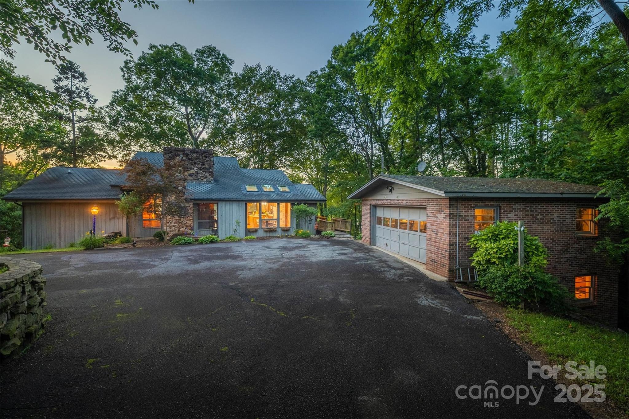 This opportunity doesn't come along often, LAKE FRONT HOME with 14+ ACRES with NO HOA! Nestled on prime land, this 3400+ sq ft lakefront offers privacy and tranquility. Enjoy main channel views with 475+- of shoreline. Driving along the magical, secluded driveway provides a peaceful escape, perfect for those seeking a retreat or looking to develop additional land. The property features a spring branch, ideal for horses or cattle. Although the home needs a little TLC, it has endless possibilities. Inside home, it has spacious living areas, with soaring cathedral ceilings, a loft & oversized windows, providing lots of natural light showcasing the stunning lake views. The lower level has the potential 3rd bedroom or in-law quarters. This home offers ample room for family and guests, making it perfect for entertaining or relaxing. Whether you're looking to create an equestrian estate, working farm, or serene sanctuary, this property is full of possibilities.Listing agent to be at showings.