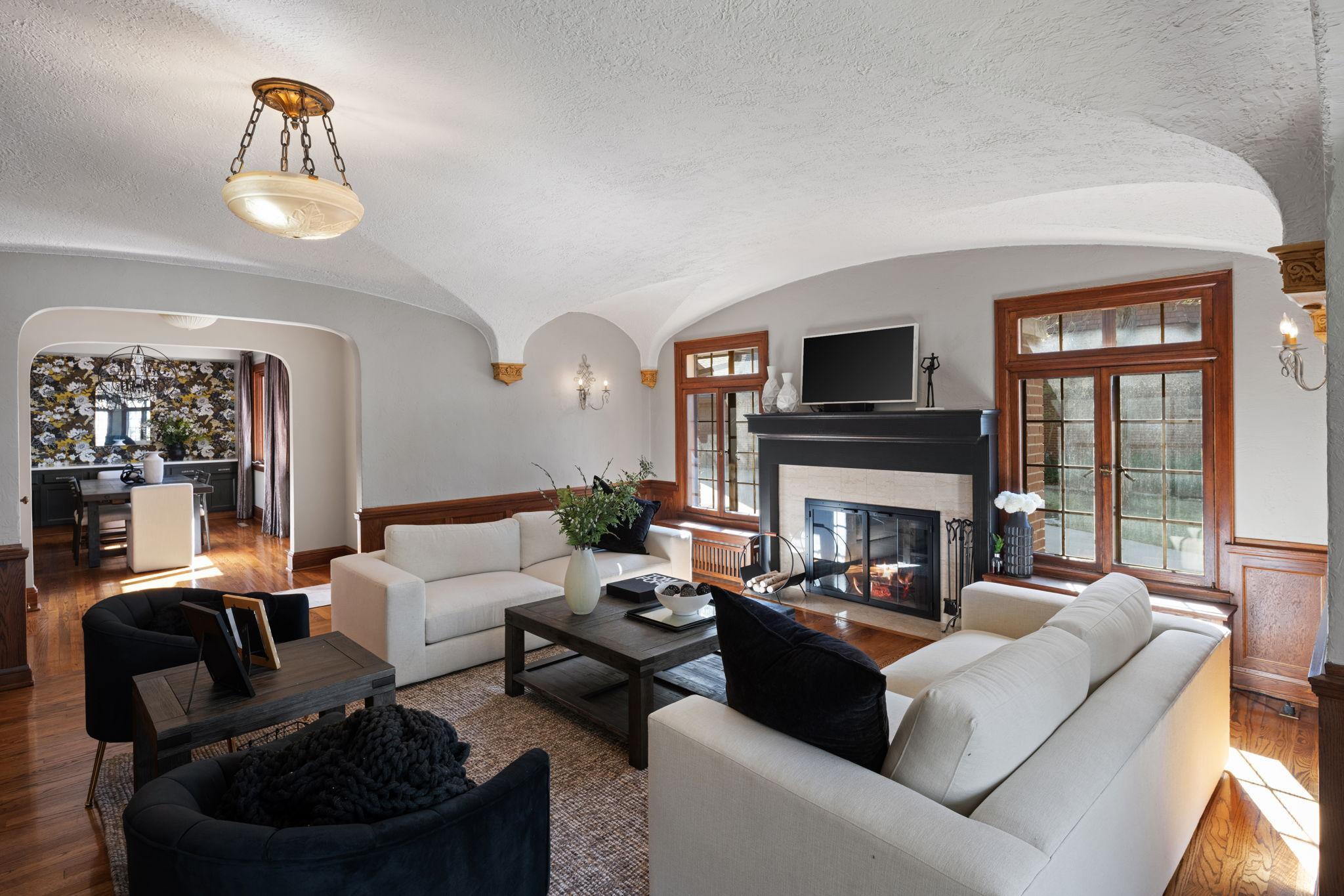 Set just moments from Lake of the Isles, this expansive four-bedroom residence offers the rare comfort and scale of a single-family home with the ease of condominium living. A seamless blend of timeless architectural charm and refined modern updates defines every space, where rich millwork, detailed craftsmanship, and gracious proportions create an elevated yet inviting atmosphere.The main level unfolds with effortless flow, ideal for both everyday living and entertaining, while the private patio provides a serene extension for outdoor relaxation. The luxurious owner’s suite serves as a true retreat, featuring generous proportions and a sense of quiet sophistication.The thoughtfully finished lower level elevates the home even further, complete with a stylish wet bar and dedicated home gym—perfect for hosting, unwinding, or staying active without ever leaving home.With its unmatched combination of character, scale, and proximity to one of the city’s most beloved lakes, this residence presents a rare opportunity to enjoy classic elegance paired with modern convenience in an exceptional setting.