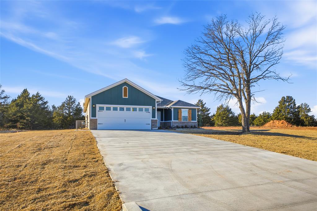 **$5,000 Builder incentive to use towards rate buy-down, closing costs, or upgrades!!**Welcome to Timberwood, Edmond’s newest large-lot community offering the perfect blend of space, style, and convenience! This beautiful Lincoln floorplan will be completed late December of 2025, and offers 3 spacious bedrooms and 2 full bathrooms on more than a half-acre of peaceful, serene land. Bright, sunbathed, airy and open, the spacious kitchen features granite countertops, a center island, stainless fixtures and appliances, plenty of storage and a large pantry. The kitchen opens to a dining and cozy living room, with upgraded wood-look tile and plenty of large windows for spectacular views! The primary suite features a private bath with a large vanity and a spacious closet, along with two additional bedrooms and another large bathroom. All of this rests on a large lot that not only offers stunning sunrises and sunsets that will take your breath away, but also peaceful, starry nights where you can gather around a fire pit with family and friends and actually be able to see the night sky! The community is SHOP-APPROVED and also qualifies for USDA (zero-down!), and is located in the highly-sought after Edmond Public School District, and conveniently located near plenty of restaurants and shopping, and only minutes from Oklahoma City, Tinker AFB and Stillwater! ***PLUS AGAIN $5,000 Builder Incentive towards upgrades, a fence, a storm shelter, or closing costs!! Ask how several families have already been able to purchase their home this year, bringing ZERO to the closing table and getting a check back at closing!!***