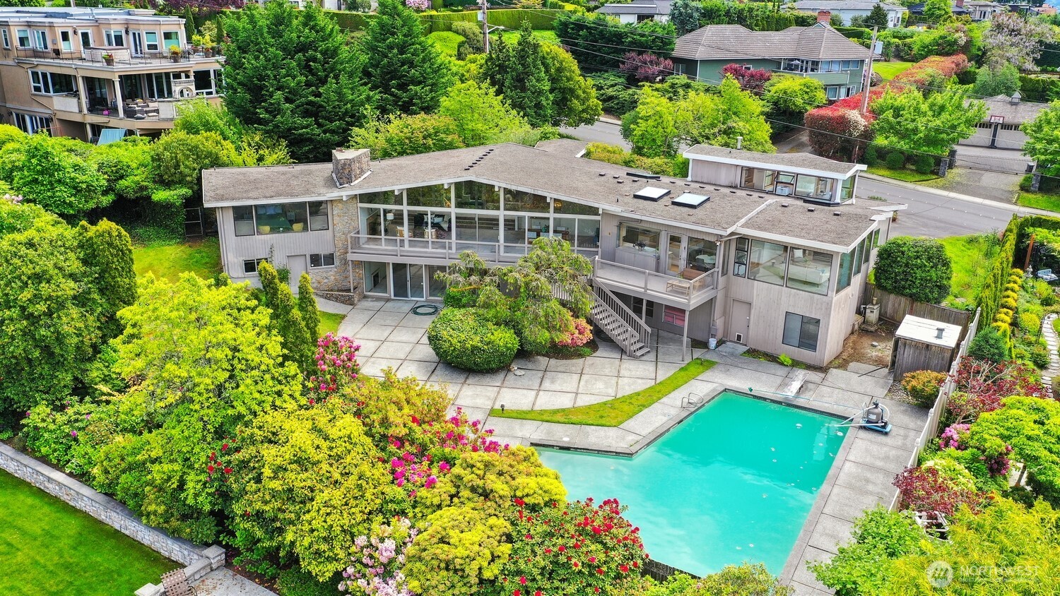 COMPLETELY REMODELED INTERIOR! On Main floor featuring: new flooring, appliances, counters & more. A brand-new heat pump provides efficient heating and cooling. Nestled in one of Clyde Hill’s most sought-after neighborhoods, this home sits on a generous lot with sweeping views of Lake Washington, the Olympics, and territorial landscapes, plus downtown Seattle views from the family room and upper bonus room. With solid bones, ample square footage, and timeless mid-century character, it’s primed for reimagining; whether through further renovation or adding a level for the pristine views. Exceptional value awaits in this premier location near top-rated schools, downtown Bellevue, and easy Seattle access. Don’t miss this rare opportunity!