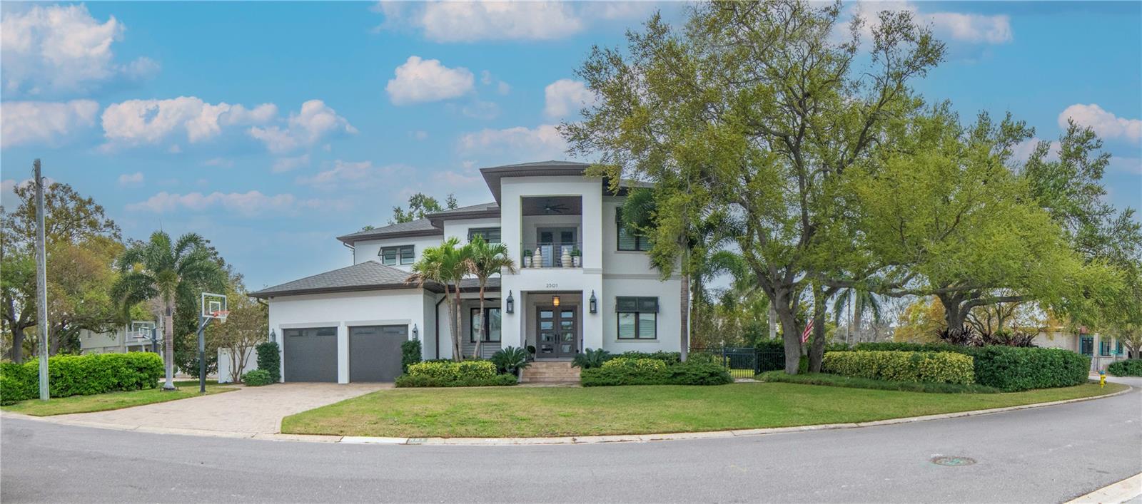 The South Tampa Trifecta: Location, Land and Water - rarely found together at this scale. Some homes check one box. A rare few check two. This South Tampa estate checks all three! A sought-after address in one of Tampa Bay's most coveted neighborhoods, an exceptional side lot that delivers the open-air breathing room you simply cannot find anymore, and private waterfront access complete with a dock ready for parties, dock dinners, sunset cruises and weekend adventures on the bay.   Seize your chance to own a truly unique South Tampa estate! A newer home constructed and situated on a rare double lot with deeded water access and a private dock/boat lift; this modern home is a “one of a kind” property. Set on a beautifully manicured half-acre, this estate combines contemporary design with resort-style living.  Imagine hosting gatherings in the top-tier chef’s kitchen, relaxing by the beautiful pool, or having a siesta on the lanai.  Memories made while playing ball in the huge yard, fishing off the dock, or taking a sunset cruise out in the bay.  This isn’t just a home; it’s an opportunity to own something exceptional.Located among Tampa’s most notable residents, this property, built by Devonshire, offers luxury and exclusivity. The double lot stretches along S. Dundee Street and Beach Avenue, with direct deep-water access to the Bay, perfect for boating enthusiasts. The additional lot provides flexibility, whether you want to add a casita, a pickleball court, or simply enjoy the extra space.Designed for comfortable living, this 5-bedroom, 6.5-bath home includes high-end finishes, oak wood floors, custom millwork, and crown moldings. The open layout features a gourmet kitchen that connects to a spacious great room, leading to a private backyard with a pool, spa, and outdoor kitchen, ideal for entertaining.The chef’s kitchen is equipped with Thermador stainless steel appliances, including double ovens, a warming drawer, refrigerator, and dishwasher, along with custom cabinetry and quartz countertops. The sprawling master suite offers a large, custom walk-in closet. Additional conveniences include laundry rooms on both levels, a full cabana bath, a first-floor secondary master suite, a Culligan water filtration system, dual tankless water heaters, and an Elon technology stack for home entertainment.Constructed with quality materials like Icynene insulation and Low-E impact windows, this home blends efficiency with style. Every detail reflects superior craftsmanship. To explore this property, call to schedule a private showing.