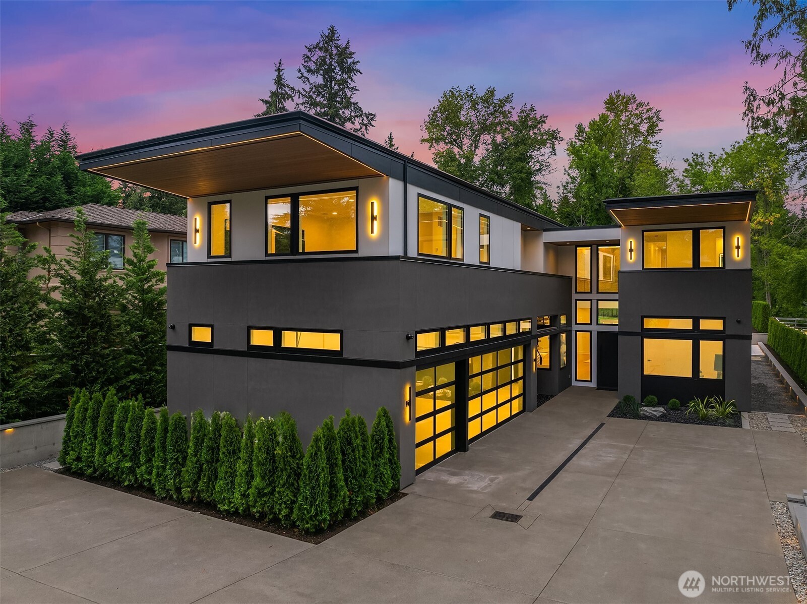 Highly sought after Medina, luxury modern new construction residence.  This 5 bedroom 6 bath, 6629 sq ft home sits on almost a 20,000 square  foot estate feel lot with large covered outdoor living and entertaining  areas. Stunning finishes throughout the home. Gated entry to home, two  story atrium with skylights, 11 ft first floor features a gourmet kitchen,  scullery and cantina with large living and dining areas. Sauna, fitness,  office/meditation area and mudroom all on main floor. Beautiful master  suite, deck, large his and her closets, and all bedrooms and bathrooms  ensuite. Large Bonus/media room. Spectacular McCullough Architect  design built by MGM Construction and AM Development, LLC.