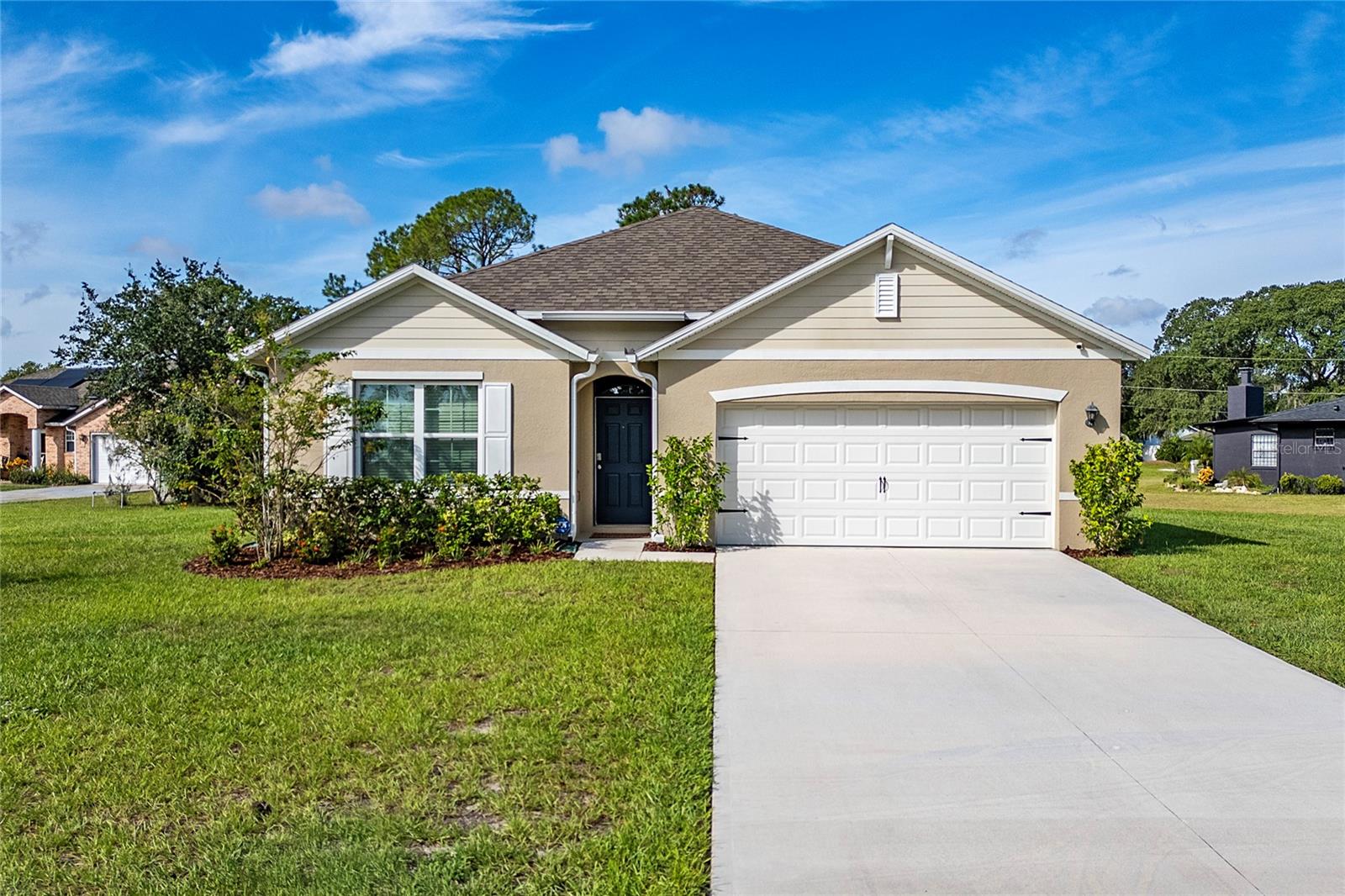 NEW PRICE + BUYER INCENTIVE! MOTIVATED SELLER!Welcome to this modern 4-bedroom, 2-bath home built in 2023, ideally situated on a quiet cul-de-sac in desirable Deltona Lakes. Offering 1,836 sq ft of open-concept living space, peaceful lake views, and a spacious 14,630 sq ft lot, this home blends contemporary comfort with functionality and privacy.The thoughtfully designed layout features modern finishes, energy-efficient systems, and the added peace of mind of a builder’s warranty. Price just reduced by $10,000 and offering $5,000 toward buyer’s closing costs with an offer at the asking price.No HOA and conveniently located with quick access to I-4 and SR-415, just minutes from Campbell Park, Dupont Lakes Park, Thornby Park, Lake Monroe, and Lyonia Preserve. Enjoy being close to Florida’s most popular destinations: Orlando (30–40 minutes) with Disney World, Universal Studios, and SeaWorld; Daytona Beach (30–40 minutes) with its beautiful coastline and the Daytona International Speedway; Blue Spring State Park (15 minutes), famous for manatees, kayaking, and hiking; and De Leon Springs State Park (20–25 minutes), home to a natural spring and the iconic Old Sugar Mill restaurant.This home truly offers the best of both worlds — a modern, spacious residence in a peaceful setting with easy access to beaches, state parks, and all the excitement of Central Florida. A unique opportunity to enjoy the authentic and relaxed Florida lifestyle.Property is vacant and easy to show. Seller ready to review offers.