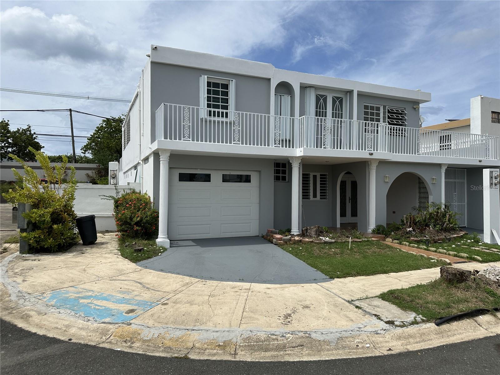 Property located in a gated community with 24/7 security, currently divided into two separate units —making it ideal for rental income. The first level features 1 Master bedroom and 1 bedroom, 2 bathrooms, living room, kitchen, and carport, while the second level offers 3 bedrooms, 2 bathrooms, living room, family room, and terrace. It can also be easily converted into a single spacious family residence if preferred.