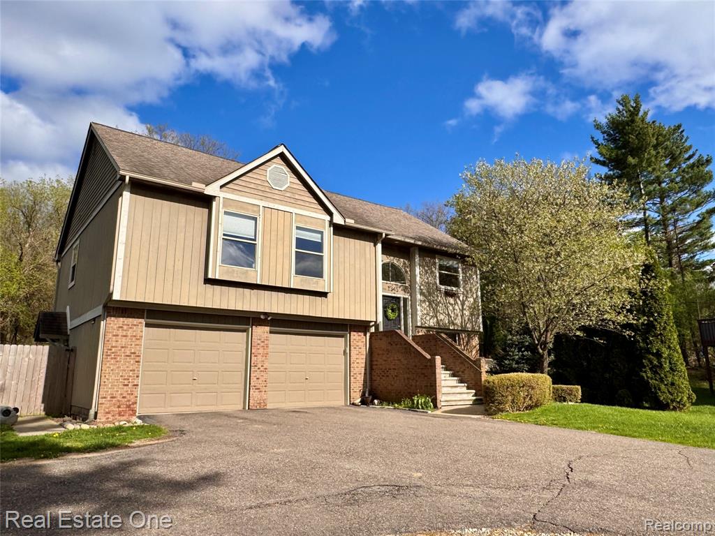 Welcome to this beautiful home just minutes from downtown Milford, offering the perfect blend of privacy, space, and convenience. 3-bedroom, 2-bath home offering 1,900+ square feet of comfortable living space on just under 2/3 of an acre. Nestled in a desirable location, this property combines space, convenience, and lifestyle. Step inside to find a bright, open floor plan with generous living areas perfect for both everyday living and entertaining. The kitchen flows seamlessly into the dining and living areas, creating a warm and inviting atmosphere. Outside, enjoy a large, fenced backyard with endless possibilities—ideal for gatherings, gardening, or simply relaxing in your own private outdoor retreat. Located just minutes from major expressways, this home offers an easy commute while still providing a peaceful setting. Outdoor enthusiasts will love the proximity to scenic biking trails and local parks, making it easy to stay active and enjoy nature. NEW SEPTIC FIELD AND TANK SPRING 2025  Some rooms virtually staged