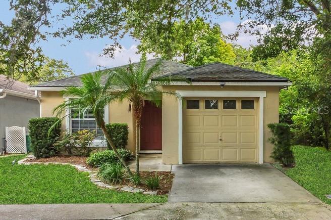 Here's your chance to make this quaint 3-bedroom, 2-full bathroom home your very own! This single-story, BLOCK construction home is nestled in the Deer Run community at the end of a CUL-DE-SAC. Greeted by a covered front entrance, you'll enter the home and notice the SPLIT FLOORPLAN with the first two bedrooms in the front, separated by the guest bathroom. The primary bedroom features a WALK-IN closet. Both bathrooms boast NEW toilets and modern vanities. Other upgrades include a NEW sliding glass door, NEW blinds throughout, NEWER laminate flooring in the bedrooms and main living areas, and NEW interior paint. The kitchen overlooks the living and dining room combo, and is complete with STAINLESS STEEL appliances, including a NEWER dishwasher, range, and garbage disposal, solid-surface countertops, an eating space, breakfast bar, and lovely bay window. Looking for LOW-MAINTENANCE living? The HOA is responsible for the roof and exterior of the property, as well as LAWN CARE, including mowing and maintaining shrubs. The HOA replaced the roof in 2018. The 1-car GARAGE features windows for natural lighting, shelving for storage, and the 2018 HVAC, 2022 water heater, and WASHER AND DRYER included. In addition to the garage, there's a driveway, parking space in front of the home, and bonus guest parking spots surrounding the home. What makes this particular lot extra special is how quiet it is being tucked at the end of the cul-de-sac, adjacent to a pond and mature, large trees, which add to the PRIVACY and provide plenty of SHADE to help save on energy. Imagine waking up every morning and going out front to be greeted by the beautiful POND view with ducks soaking up the sun! The Deer Run community features a clubhouse, POOL, and tennis courts! Conveniently located just minutes away from shopping, restaurants, public parks, and within 20 minutes of the University of Central Florida. Zoned for Seminole County public schools. Schedule a showing today! ***VIRTUAL TOUR & FLOORPLAN AVAILABLE***