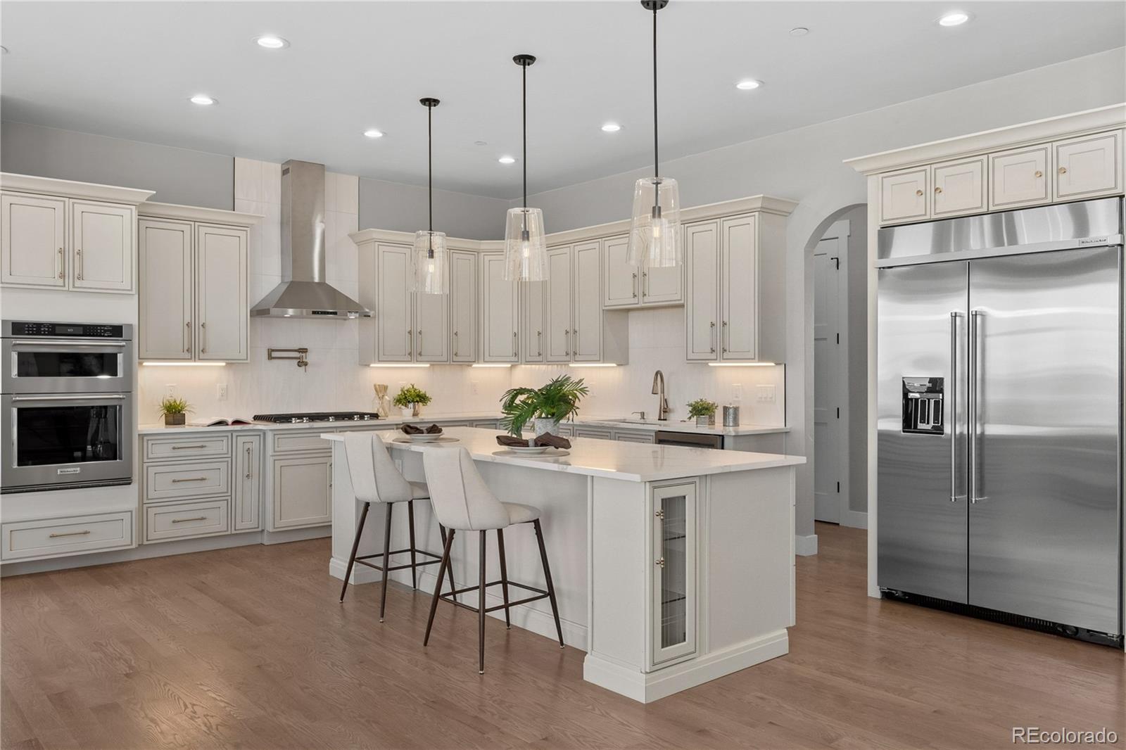 This gorgeous new build offers an abundance of natural light throughout, highlighting the 30-foot ceilings on the main level. This home Features 5 bedrooms, 5 bathrooms, and two spacious primary walk-in closets. Take the beautiful curved staircase to a fully finished basement with a bar, perfect for entertaining. The oversized attached garage includes RV parking—ideal for all your vehicles, gear and recreational toys. Best part no HOA!!