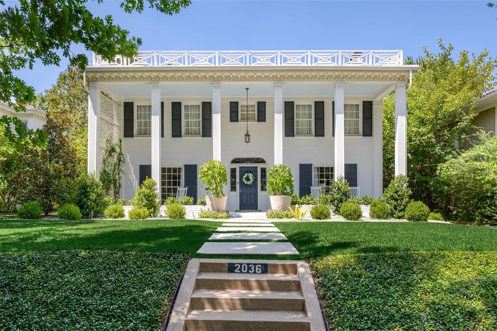 Set beneath a canopy of mature trees, 2036 Windsor Place is a gracious Fort Worth residence where timeless architecture, beautifully proportioned interiors and garden living come together with remarkable ease. A stately columned facade and expansive front porch create an unforgettable first impression, offering a sense of presence that feels both distinguished and welcoming.Inside, warm hardwood floors, graceful archways, abundant natural light and classic millwork establish the character of the home. Generously scaled living and dining spaces unfold naturally for entertaining, while large windows frame views of the surrounding greenery. The light filled kitchen pairs timeless cabinetry with stainless steel appliances, a professional style range and extensive storage. An adjoining room lined with glass front cabinetry provides an exceptional space for collections, entertaining pieces or everyday organization.Spacious accommodations continue the home’s sense of scale and serenity, with multiple windows bringing natural light and treetop views throughout.Beyond the interiors, mature landscaping creates a private garden setting with an expansive lawn, brick terrace, outdoor gathering areas and putting green, equally suited for quiet mornings, relaxed evenings and effortless entertaining. Adding to the property’s versatility, the home has been structurally engineered to accommodate a future addition, offering its next owner the opportunity to expand while preserving the character of the existing residence. With commanding architecture, established grounds, enduring character and thoughtful potential for the future, 2036 Windsor Place offers something increasingly rare: a home with a true sense of place, distinctly Fort Worth and ready for its next chapter.