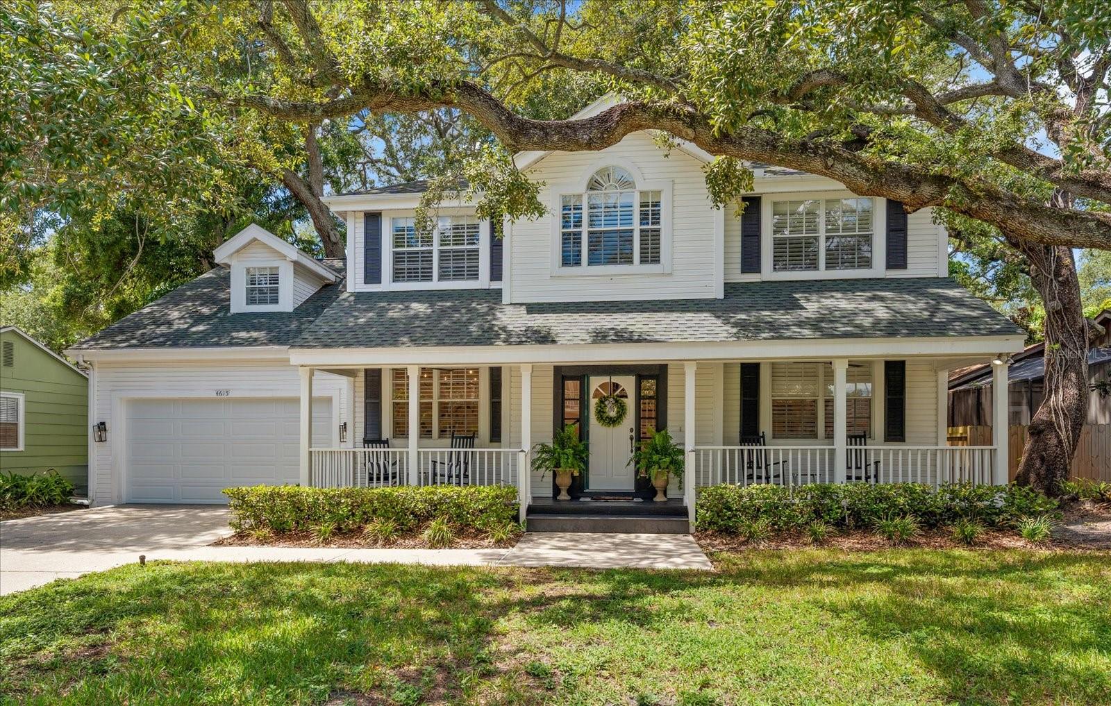 Beautifully renovated South Tampa home located on a quiet, tree-lined street! This exceptional residence blends timeless character with sophisticated updates, generous living spaces, and a versatile floor plan ideal for both everyday living and entertaining.A welcoming covered front porch, mature landscaping, and a magnificent oak canopy create an impressive first impression. Step inside to discover soaring ceilings, abundant natural light, and beautiful new hardwood floors throughout. The completely renovated kitchen serves as the heart of the home, featuring custom solid wood cabinetry, stainless-steel appliances, gas cooking, a large center island, and designer lighting. An adjacent custom bar and beverage area with wine refrigerator provides an elegant space for entertaining.Multiple living areas offer both comfort and flexibility, including a formal dining room, inviting sitting room, and spacious family room highlighted by a beautiful fireplace. The open and airy layout flows naturally from the kitchen to the main living areas and outdoor spaces.Upstairs, the expansive primary suite offers a private retreat with generous proportions, room for a sitting area, and a beautifully renovated primary bathroom. Well-appointed secondary bedrooms and abundant storage enhance the home's functionality. A substantial bonus room provides exceptional flexibility for a media room, game room, home office, gym, or additional living space.Outdoor living is equally impressive. French doors open to an expansive screened and covered rear porch overlooking a beautifully landscaped and shaded backyard. With multiple areas for lounging, dining, and entertaining, this inviting space seamlessly extends the living area outdoors. A large detached storage shed provides additional storage and functionality.Additional upgrades include a tankless gas water heater, new garage door, new hardwood flooring, renovated kitchen and primary bathroom, extensive storage throughout, and an attached garage.Ideally situated in the heart of South Tampa, the home offers convenient access to Bayshore Boulevard, South MacDill Avenue, Hyde Park Village, Downtown Tampa, Tampa International Airport, and MacDill Air Force Base, along with an outstanding selection of nearby dining, shopping, and entertainment.Highly motivated sellers, and furniture is negotiable. An exceptional opportunity to own a beautifully renovated home offering impressive interior space, outstanding outdoor living, and a desirable South Tampa location. Schedule your private showing today!