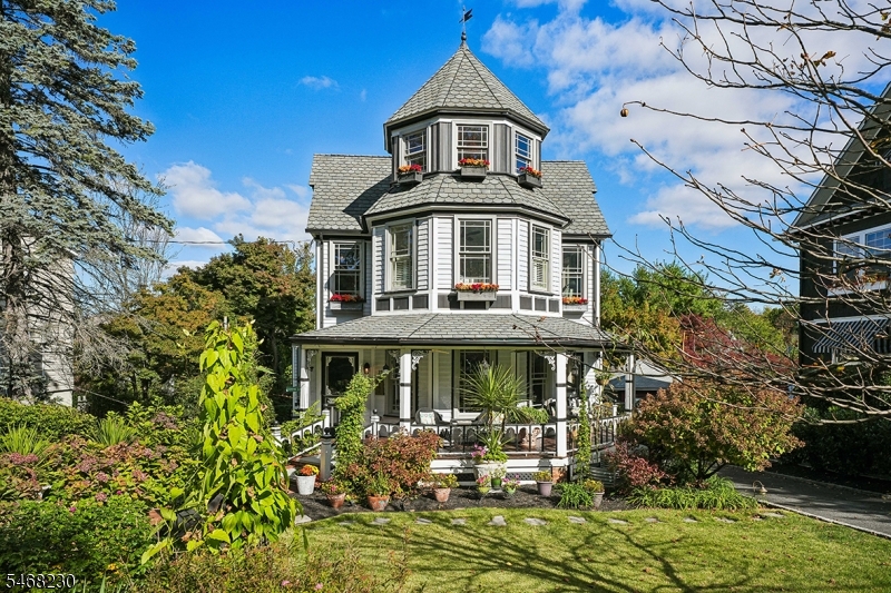 One of a kind!  Renovated iconic Victorian in close to town location.  New since 2021: Roof, Central Air Condenser and Furnace.  Custom chef's kitchen with Danby marble counters and high end appliances.  Brazilian hardwood floors, windows replaced through most of the home, updated 200 amp electric and built in generator. High ceilings and Back Staircase.  Home Office, spacious second floor Laundry and incredible outdoor living! Inviting Front Porch, Deck and Patios overlooking beautiful manicured rear yard with fruit trees, koi pond, walking paths and potting shed.  This one is not to be missed!  Move in and enjoy all that Summit offers.