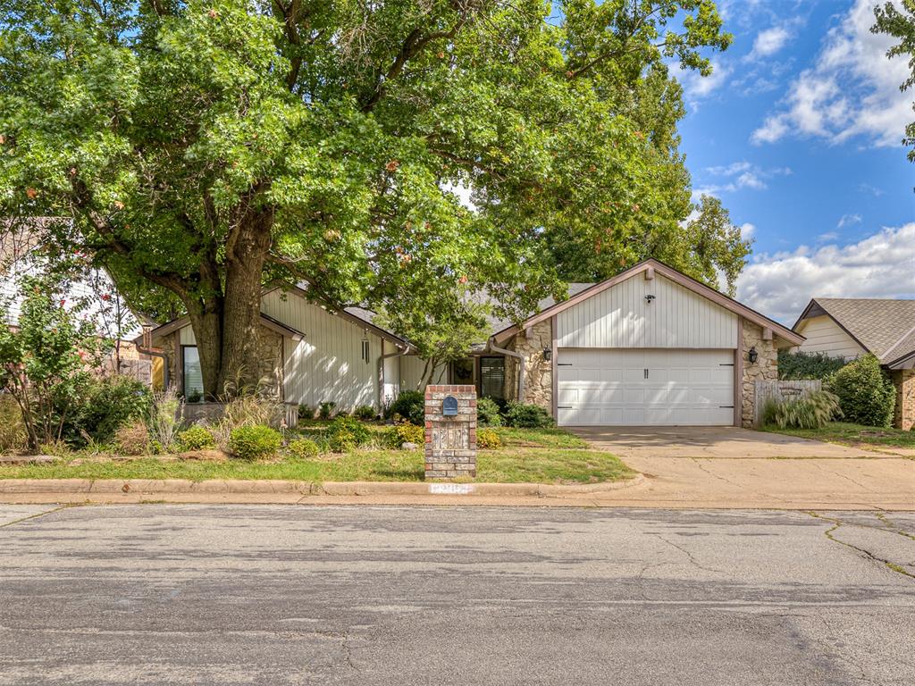 Welcome to this charming and unique 3-bedroom, 2.5-bathroom home tucked into a pleasant and peaceful neighborhood ~ Thoughtfully updated while maintaining its original 1977 character, this home offers the perfect blend of comfort, manageability, and timeless style ~ Step inside to find an easy-flowing layout featuring tile and hardwood floors, high ceilings with wooden beams, and a stunning rock fireplace that anchors the living room ~ The kitchen is a true highlight with granite countertops, statement lighting, excellent storage, and a stylish coffee bar ~ Multiple dining areas — including both a formal and casual space — make entertaining effortless ~ The primary suite includes an additional room ideal for a sitting area, workout space, or home office. The extra sunroom offers endless possibilities for relaxation or creativity ~ Outside, enjoy a covered patio overlooking a spacious, tree-shaded backyard that creates a tranquil, private atmosphere — your own peaceful oasis ~ With numerous updates to the paint, flooring, fixtures, and exterior, this gorgeous home perfectly balances modern touches with classic charm  ~ Ready to welcome you home.