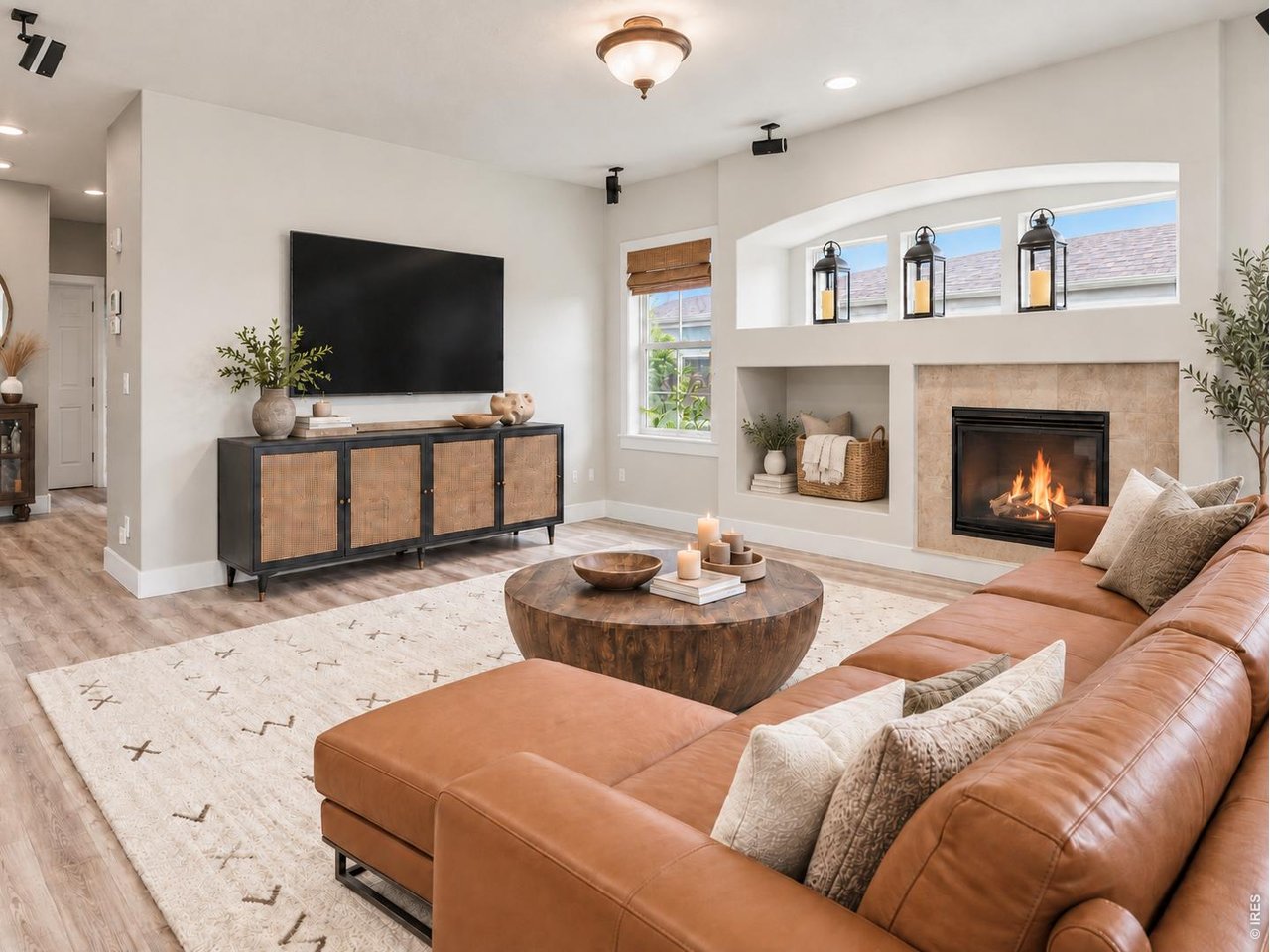 Welcome to 1418 Falcon Place, where generous living spaces, mountain views and the Colorado lifestyle come together in Erie's sought-after Vista Ridge community. From the moment you step inside, soaring vaulted ceilings, hardwood floors and abundant natural light create a bright and inviting first impression. Designed with both everyday living and entertaining in mind, the main level offers a spacious kitchen with an oversized island, abundant counter space, stainless steel appliances and a gas cooktop, opening seamlessly to the family room anchored by a cozy fireplace. A formal living room, dining room, dedicated home office that could function as a 5th bedroom, powder bath and convenient laundry room with utility sink complete the main level. Upstairs, the spacious primary suite feels like a true retreat, featuring mountain views, five-piece bath and two closets. Two additional bedrooms and a generous loft provide plenty of flexibility for a second office, playroom, media space or lounge. The finished basement adds an entirely new level of living and entertaining space with a second fireplace, wet bar, recreation and game areas, plus an additional bedroom and bathroom-ideal for guests or extended stays. Outside, unwind on the back deck and take in Colorado's beautiful moutain views skies and sunsets. An attached three-car garage provides ample room for vehicles, gear and additional storage. Set within the established Vista Ridge community, residents enjoy access to neighborhood amenities, parks and trails, all centered around Colorado National Golf Club. With multiple indoor and outdoor living spaces, mountain views and a floor plan designed to flex with the way you live, 1418 Falcon Place offers the space, setting and lifestyle that make Vista Ridge such a special place to call home.