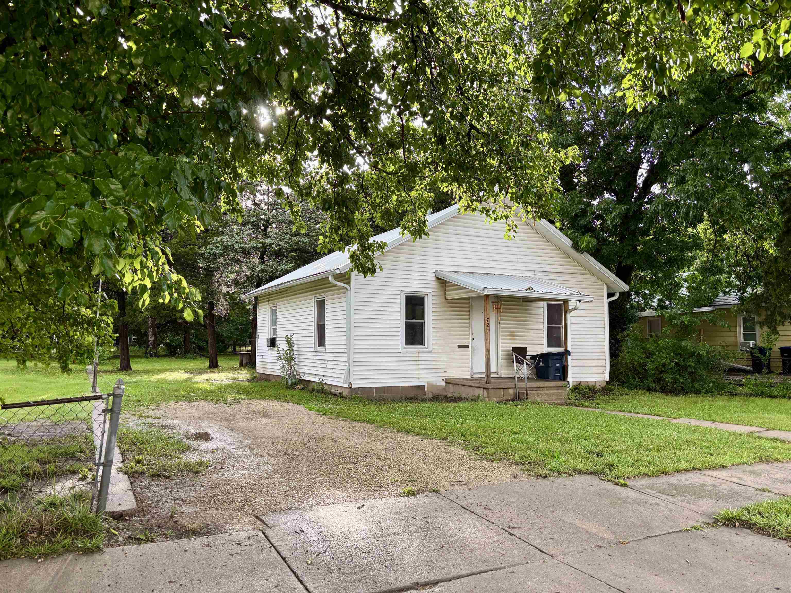 Cozy and affordable, this 728 sq ft home is ideal for downsizing or a starter home.  Home has a sizeable 13'11x12'5 master bedroom.  Windows have been updated providing home with better heating and cooling efficiency.  A spacious yard with a storage shed is perfect for outdoor activities and gardening. The durable metal roof and vinyl siding offer low-maintenance protection. The stove, refrigerator and living room window air unit, transfer with the property.