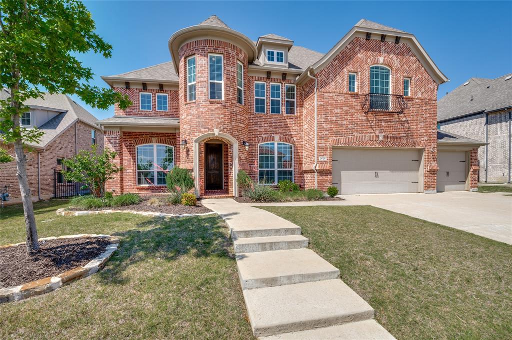 Stunning Landon Home in Frisco’s Premier Hollyhock Community! Experience luxury living in the highly sought-after Hollyhock neighborhood, perfectly situated in the vicinity of  PGA golf course. This striking Landon Home features a distinctive castle-style front entrance elevation that welcomes you into an expansive, light-filled floor plan.The heart of the home is a dramatic two-story family room that flows seamlessly into a dream kitchen, complete with stainless steel appliances, premium cabinetry, and a walk-in pantry. A beautifully shaped center island between kitchen and family room serves as the perfect hub for entertaining. The layout is both elegant and practical, and is further enhanced by the low-maintenance engineered wood flooring throughout the main living areas.Rare and highly desirable, the first floor hosts both the primary suite and a convenient guest suite. Upstairs, the spaciousness continues, supported by an entertainment theater, an additional guest suite and two bedrooms. A 3-car garage allows for ample storage. Enjoy Hollyhock’s resort-style amenities, including parks, fitness centers, and trails in the park and in the vicinity of the golf course, all within the prestigious Frisco ISD!!! Schedule your private tour today!