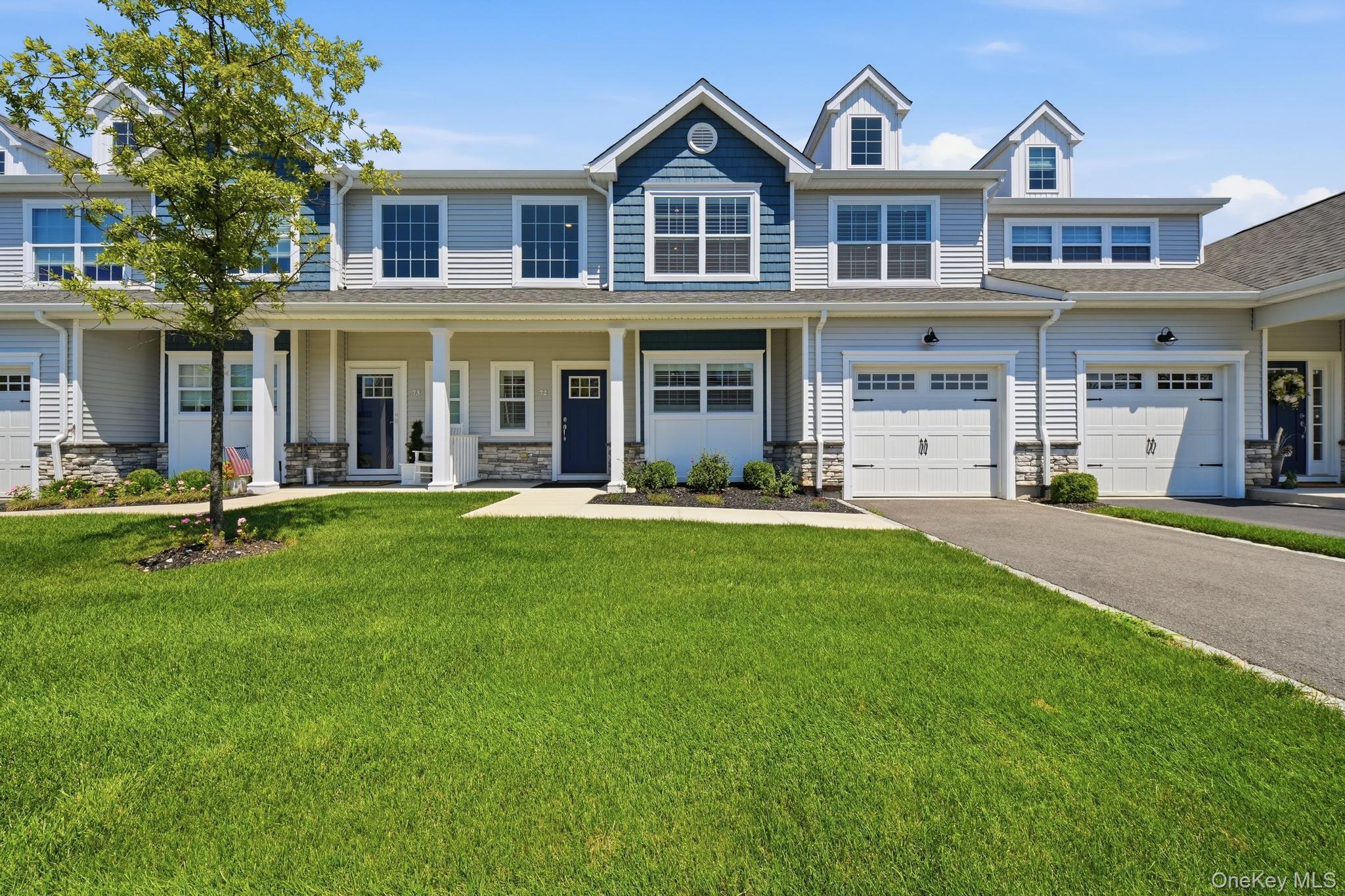 Luxury, low maintenance living awaits in The Vineyards at Mount Sinai, one of Long Island's premier gated 55+ communities. Built in 2023, this stunning Barolo model offers 2 bedrooms, 2 full baths, 2 half baths, and a thoughtfully designed open floor plan with custom finished oak floors, featuring modern finishes throughout. The beautifully appointed kitchen with quartz counters, stainless steel appliances opens seamlessly to the spacious living and dining areas, creating the perfect space for everyday living and entertaining. Tons of natural light throughout! A generous primary suite, additional guest accommodations, and multiple levels of finished living space provide comfort and flexibility for family and visitors alike. The full finished basement with high ceilings and an egress window provides extra living space with an unfinished portion for utilities and extra storage space. Residents enjoy resort style amenities including an elegant clubhouse, fitness center, heated outdoor pool, pickleball and bocce courts, walking paths, and a vibrant social calendar, all with the convenience of low maintenance living. Ideally located just minutes from Port Jefferson Village, Cedar Beach, local golf courses, wineries, shopping, restaurants, Stony Brook University Hospital, and major roadways, this exceptional home offers the perfect blend of luxury, convenience, and lifestyle. Some photos have been virtually staged.