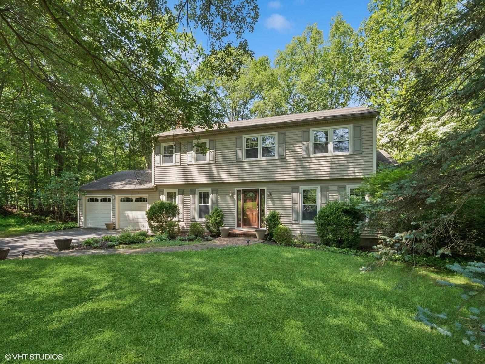 Set on a peaceful, dead-end street, this classic Colonial offers a rare blend of privacy, livable space, and natural beauty. Nestled on almost 2 acres with a gently sloping lawn and a seasonal pond view, the setting is quiet and inspiring — ideal for those who value connection to nature without sacrificing convenience. Inside, the home welcomes with hardwood floors throughout, a generous family room with a wood-burning fireplace, and a formal dining room for everyday meals or special gatherings. The kitchen opens directly to a large rear deck, perfect for entertaining or relaxing beneath the tree canopy. Upstairs, the primary suite offers a walk-in closet and private bath, while three additional bedrooms provide space for guests, home offices, or family needs. The finished lower level offers flexible bonus space for a media room, home gym, or playroom, along with a separate utility/storage area. Located in the Katonah-Lewisboro School District — with Meadow Pond Elementary nearby — this home is also just minutes from some of the area’s best outdoor family destinations. Onatru Farm Park: Trails, sports fields, and open space host everything from everyday recreation to community events like the Fine Day Fair. Wolf Conservation Center: A unique wildlife preserve offering educational programs and family-friendly experiences year-round. Muscoot Farm (Katonah): A working farm with seasonal activities and animals, perfect for weekend family outings. Ridgefield Rail Trail: A scenic 2.3-mile walking and biking path just across the CT border. Enjoy everyday essentials and boutique shopping in South Salem and Ridgefield, CT, both a short drive away. For commuters, the location offers quick access to Route 35, I-684, and the Saw Mill Parkway, plus nearby Metro-North stations in Katonah or Ridgefield. The home has been well-maintained, is move-in ready, and is waiting for you!