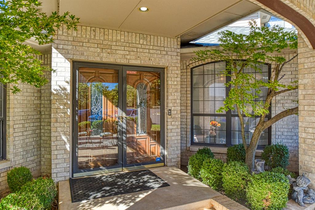 Welcome to 3617 Hampton Court  nestled in a quiet Cul-de-sac close to all your favorite shops and restaurants. This spacious home features 3,505 of living space with 3 living areas, study, 4 bedrooms and 2 and a half bathrooms. Step inside to the first living area with a gas fireplace that is shared and separates the second living area. Off the first living area is the formal dining room and the study. Step into the second living area and enjoy that same fireplace with bookshelves on each side. The spacious kitchen is open to this second living area with lots of room to cook and plenty of cabinets for storage. The island serves as work space or seating for meals.  The Florida room is also off the second living area and this room would be great for so many things with its  vaulted ceilings and 3 sliding doors with so much sunlight coming through. The primary suite which is located downstairs is a true sanctuary, offering a luxurious en-suite bathroom with double vanities and generous closet space with laundry room inside the closet. The Additional bedrooms which are located upstairs are spacious with walk in closets. The bathroom upstairs is truly amazing with double vanities including a sitting area to get ready. The tub is a large soaking with shower. You will also find a second laundry room upstairs so no hauling laundry downstairs.  The front of the home has a covered parking area or use it for a large covered patio. Out back you will find a deck the whole length of the back of the home.  This home is in impeccable condition, showcasing an abundance of natural light through numerous windows. Recent updates include a roof that is two years old, two separate HVAC systems that were installed in 2024.