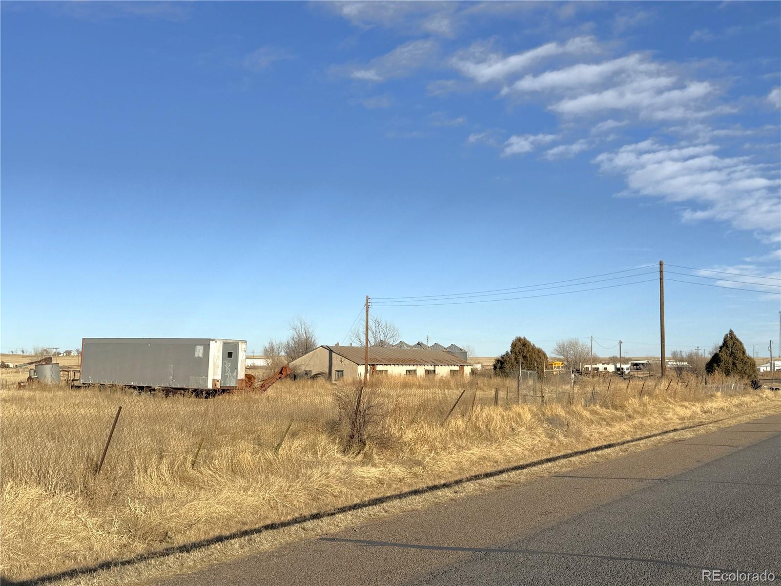 Opportunity awaits with this unique offering of 12 contiguous lots totaling approximately 45,500 square feet (just over one acre), ideally located on the east side of Hugo along the route to the Lincoln County Fairgrounds. Situated within city limits, this property offers both visibility and convenience. The site is zoned CH-1, providing flexibility for a variety of commercial or mixed-use possibilities (buyer to verify allowable uses with the City of Hugo). Water and electricity are already in place, helping streamline future development plans. With easy access, a desirable in-town location, and utility availability, this property presents a strong opportunity for investors or developers looking to establish a presence in a growing area of Hugo.