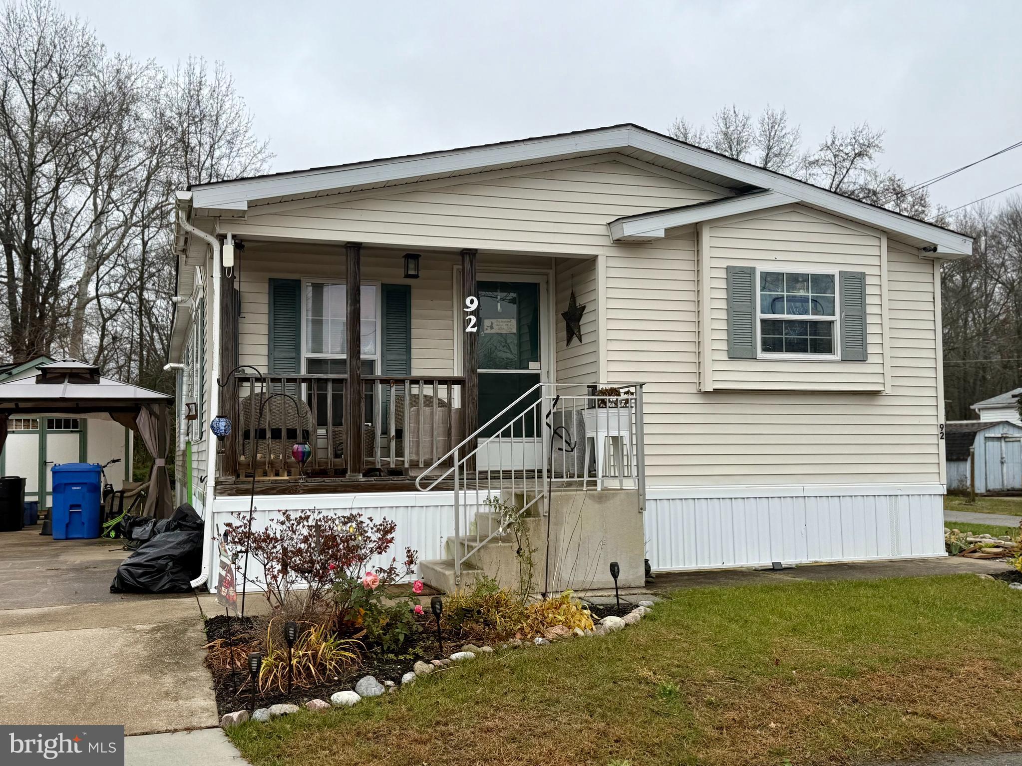 Welcome to this 2005 Marlette Manufactured Mobile Home located in Fawn Lakes Village, Shamong Township. This manufactured home is a double wide, 56 x 28, 2 Beds 2 Baths. Total Sq Ft. 1568. As you enter this open concept kitchen-living room, a  new modern gourmet kitchen with stainless steel appliances, plenty of navy wood cabinets for storage, light color counter tops. A comfortable living room with a 4 year old pellet stove that helps heat the entire home and keep the propane cost down. Following to the back of the home is a laundry room with washer, dryer and storage. Side door. A primary bedroom suite with beautiful walk/in glass doors title shower. 2nd bedroom and fully remodeled bathroom ( 3 years old) with a soaking tub. Some special features are a new kitchen and laminate floors throughout (2025). New Worry free HVAC (3 months old), Lot fee is $610 monthly and includes water, sewer, trash and main road snow removal. Electric, Propane and Cable additional. A gazebo, fish pond and new 10 x 12 shed is also included. All applicants must be approved by Fawn Lakes Village. Application is attached. $50 single $75 married application fee. Cash or Manufactured financing is acceptable. If financing please have a pre approval ready at time of putting in an offer.
