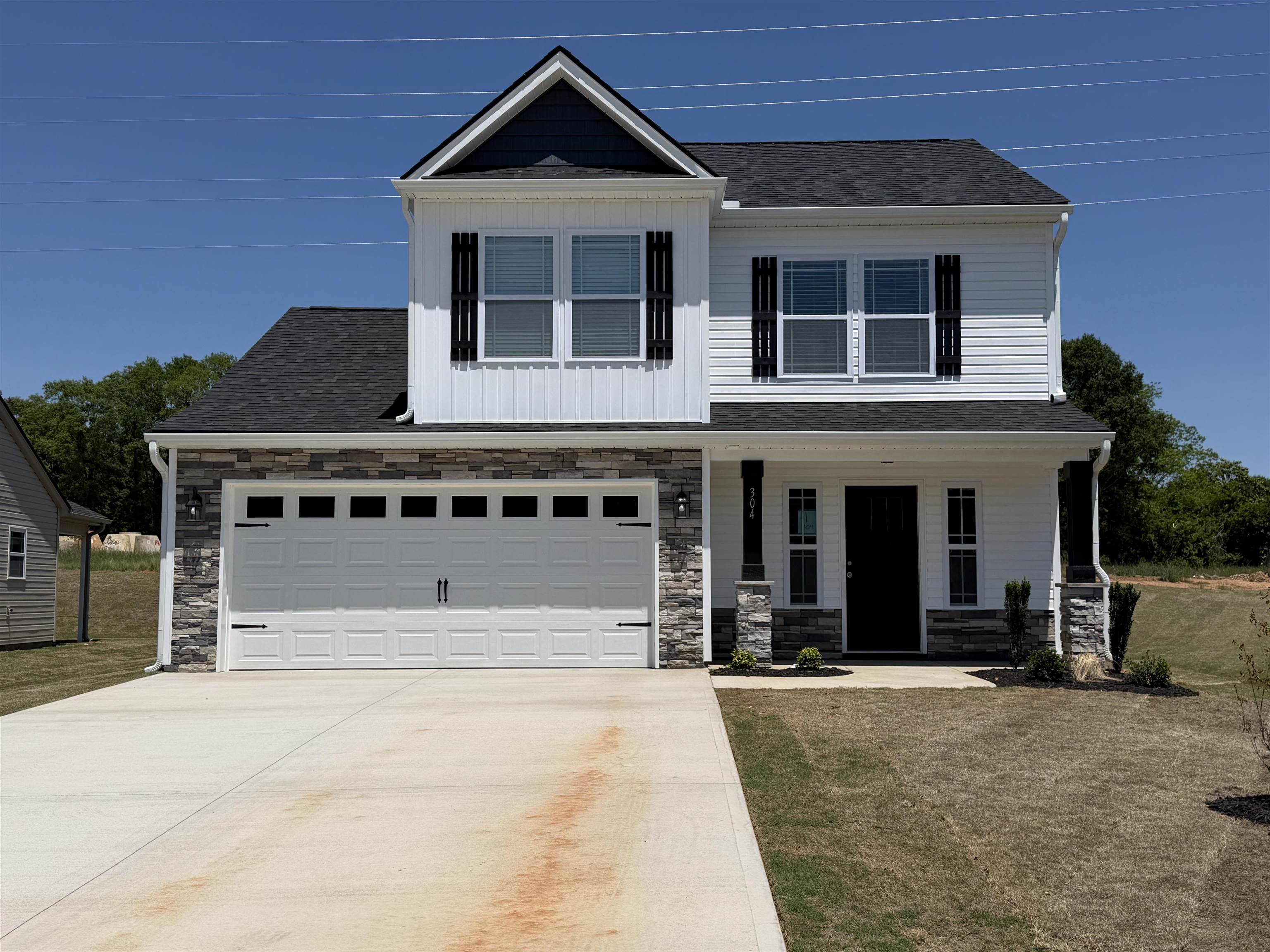 MOVE IN READY! Welcome to the Reynolds floor plan, located in the BRAND NEW Stones Throw community in Inman. This thoughtfully designed two-story home offers a functional and inviting layout perfect for today’s lifestyle.The main level features an open-concept living area that seamlessly connects the kitchen, dining, and great room. The kitchen offers ample cabinet space and flows effortlessly into the main living area. A convenient half bath completes the first floor. Upstairs, you’ll find three spacious bedrooms, including a comfortable primary suite with a private bath, plus an additional full bath. An upstairs laundry room adds everyday convenience. The home also includes a two-car garage and generous storage throughout. Located just minutes from downtown Inman, local shopping, dining, and schools. The new Stones Throw community offers small-town charm with easy access to major routes. An excellent opportunity for affordable new construction in a growing area. Closing costs incentive offered when using preferred lender and attorney!Call today for more info!