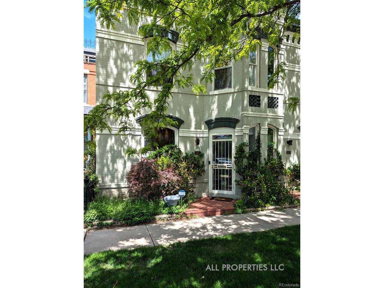 Historic 19th-Century Home in Denver's Curtis ParkWelcome to this stunning 1890 two-story brick townhome in Denver's Curtis Park Historic District. Beautifully remodeled, this home blends modern amenities with historic charm to create the ultimate urban retreat.Prime Location* Neighborhoods: Easy access to River North (RiNo), Five Points, and Ballpark cultural and nightlife districts.* Transit: Coors Field is 10 blocks away; Union Station is 1.5 miles by foot, bike, or scooter. Mountains are just 30 minutes away via nearby interstates.Home Features* Beds & Baths: 2 bedrooms, 2.5 bathrooms. Both bedrooms are upstairs with en-suite baths. Primary suite features a walk-in closet and private balcony. * Laundry: Conveniently located laundry room with washer/dryer in corridor between bedrooms.* Living Spaces: Bright, open main-level floor plan with a large stairwell skylight maximizing natural light.* Kitchen: Open layout with island, backlit custom bar, gas range, side-by-side fridge, dishwasher, and microwave.* Outdoor Oasis: Enclosed backyard with grill, fridge, built-in gas firepit, dining table, and patio furniture.* Parking & Climate: 2-car detached garage with 220V EV charging port. Equipped with an evaporative cooler and forced air heat. Neighborhood Amenities* Culture: Just 4 blocks from RiNo breweries and concert venues. Historic Five Points music and food stops nearby.* Fitness & Shopping: Walk to yoga, Pilates, TRX, and climbing gyms. Whole Foods is 1 mile away; Safeway is 7 blocks away.Immerse yourself in downtown Denver's vibrant lifestyle. Don't miss this historic gem!