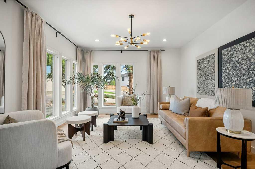***Open House SATURDAY Oct. 25th 11am-2pm*** Welcome to 113 Straddock Terrace SW, an exquisitely renovated residence in the prestigious community of Strathcona Park. Nestled on a quiet cul-de-sac, this five-bedroom, three-and-a-half-bathroom home boasts over 2,000 sq. ft. of thoughtfully designed living space, blending timeless style with modern convenience. From the moment you arrive, the brand-new front porch and updated entry door create a warm first impression, leading into an open-concept interior filled with natural light streaming through new triple-pane windows. The main floor showcases engineered white oak hardwood flooring, refined finishings, and a cozy gas fireplace, while the heart of the home—the kitchen—features quartz countertops, premium cabinetry, and all-new high-end Forno appliances including a 36” gas range and matching refrigerator. A unique filtered water system is integrated from sink to fridge and stove spout, complemented by new designer lighting and smart outlet upgrades throughout. Upstairs, the primary suite is a true retreat, offering a private balcony, sitting or vanity area, spacious ensuite, and a remarkably versatile walk-in closet that could even function as an additional room, while an upper-level fireplace—adaptable for wood or gas—adds charm and warmth. The fully finished basement extends the living space with a media room, full bathroom, abundant storage, and two heated storage rooms cleverly built into the crawlspace. This unique split-level design also provides a flexible room off the main floor that can serve as an office, teen retreat, or multipurpose area. Outdoor living shines on the southwest-facing pie lot, where mature trees create a private oasis. Two decks offer endless possibilities—one perfect for outdoor relaxation and another featuring a hot tub—while a cherry tree adds seasonal beauty to the backyard retreat. With over $200,000 in renovations, freshly painted stucco siding, new window coverings, and a recently inspected roof in excellent condition, this home has been transformed into a stylish and functional masterpiece. Blending refined design, a spacious and adaptable layout, and exceptional outdoor spaces, 113 Straddock Terrace SW delivers a lifestyle of elegance and comfort in one of Calgary’s most desirable neighbourhoods filled with top ranked public and privates schools, paths, parks, shopping districts, with short access to downtown core. This is a one of a kind property in Strathcona Park.