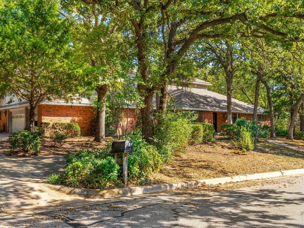 Welcome home! Perfectly situated in the sought-after, tree-lined Brook Hollow neighborhood, this 5,000 sq ft home offers 5 bedrooms, 4 full baths, 2 half baths, 2 spacious living areas, a media room, dedicated dining room, private office, and an inviting eat-in kitchen. The flexible floor plan provides separate living quarters on each end—perfect for multi-generational living or guests – and is an entertainer’s dream home. The primary suite is a true retreat with a private patio and direct access to the expansive backyard oasis. Enjoy relaxing or entertaining in this serene outdoor setting complete with a sparkling pool, patio, and a 0.61 acre lot surrounded by mature trees. The perfect blend of privacy, convenience, and community, 1004 Overhill Drive is the home you’ve been waiting for — spacious, inviting, and ready to make your own.

Additional highlights include a 3-car garage with workshop, abundant storage, and an RV hookup easily converted to an EV charger. Walk to Brook Hollow Park and enjoy easy access to SH 183, SH 121, and I-820. Zoned for highly regarded H-E-B ISD!
