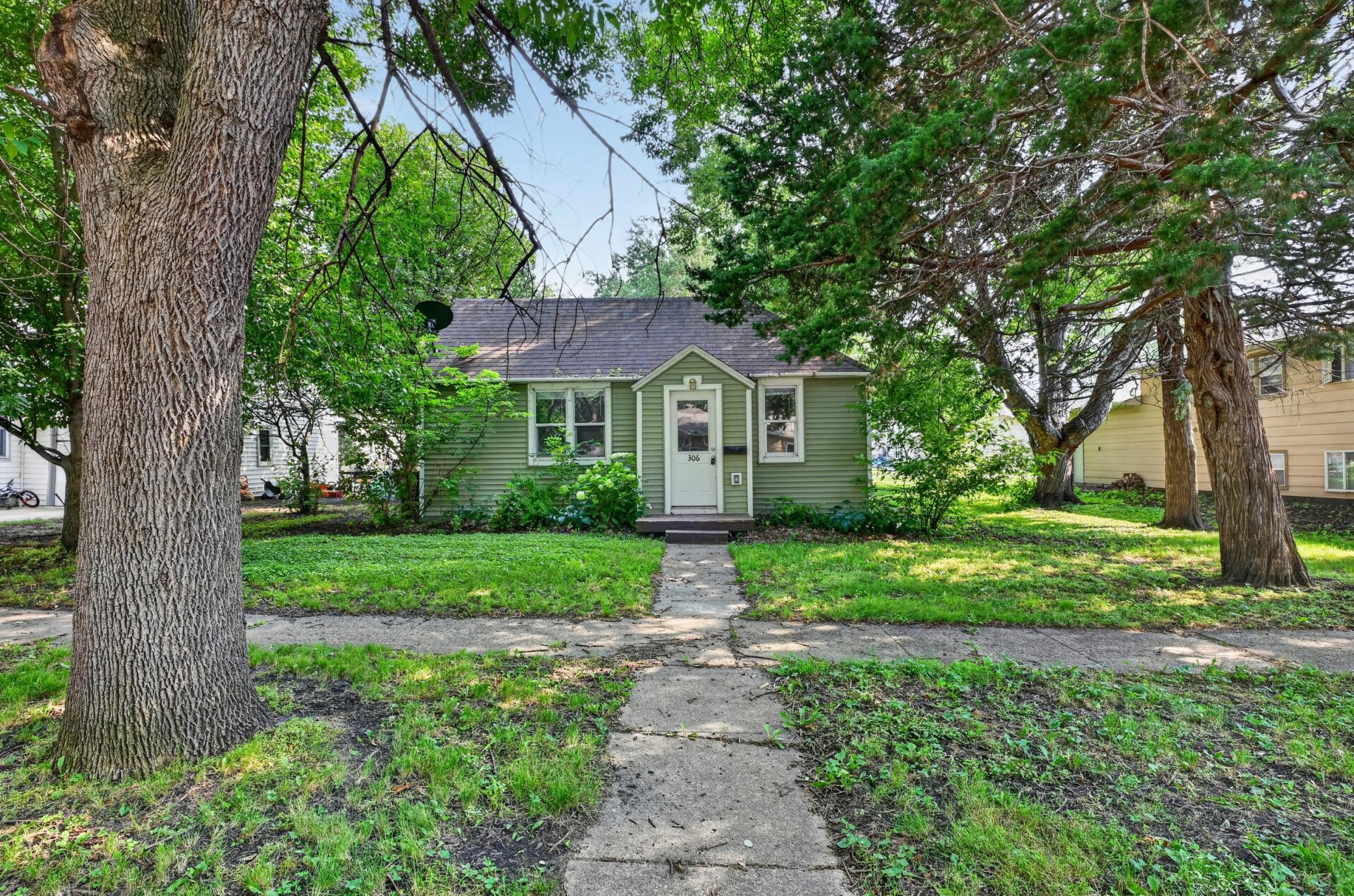Affordable, Adorable & Full of Potential! This charming 2-bedroom, 1-bath home is the perfect opportunity for first-time buyers, investors, or anyone looking for affordable living. Major updates have already been taken care of, including new windows and vinyl siding (2021), new circuit breaker panel (2022), a new bathroom floor (2026), and a new sewer line to the street installed by the previous owners. Conveniently located within walking distance to downtown, you'll love the easy access to local shops, parks, and community events. Enjoy the oversized backyard with plenty of room to add a garage, create a garden, or simply relax and entertain. With just a little cosmetic TLC—fresh paint, some floor trim, and a little sprucing up of the landscaping—this home is ready to shine. A great value with big potential! Schedule your showing today!