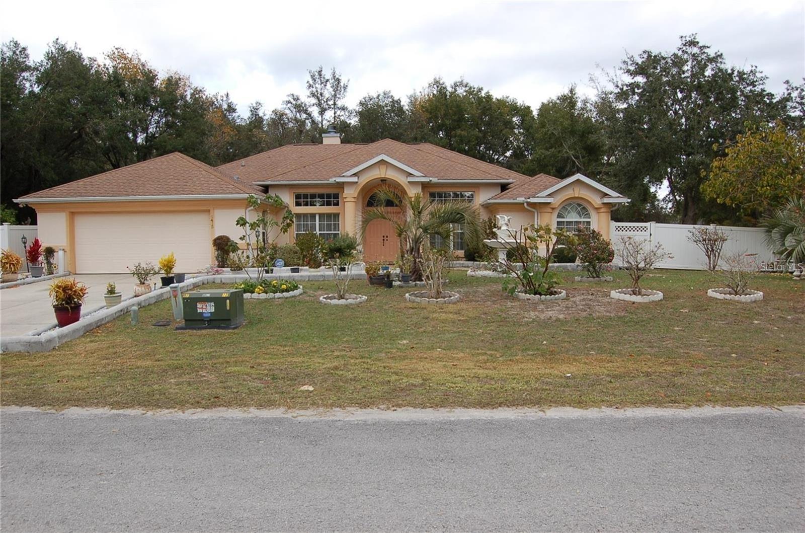 This is truly a dream home built and occupied by the original owner in 2007. This 5 bedrooms and 4 bath rooms home sits on a corner lot in a quiet neighborhood in Country Gaite Subdivision of Ocala. Home sits on .44 acres of land well kept with beautiful landscaping. A brand new roof replaced in less than 1 year along with two new A/C units less than 6 months old. There is enough for you heart to desire once you take a physical tour of this beautiful home that is well priced to sell. There is also a 24X24 entertainment room for special occasions or whatever you desire. Home is secured with vinyl fence.