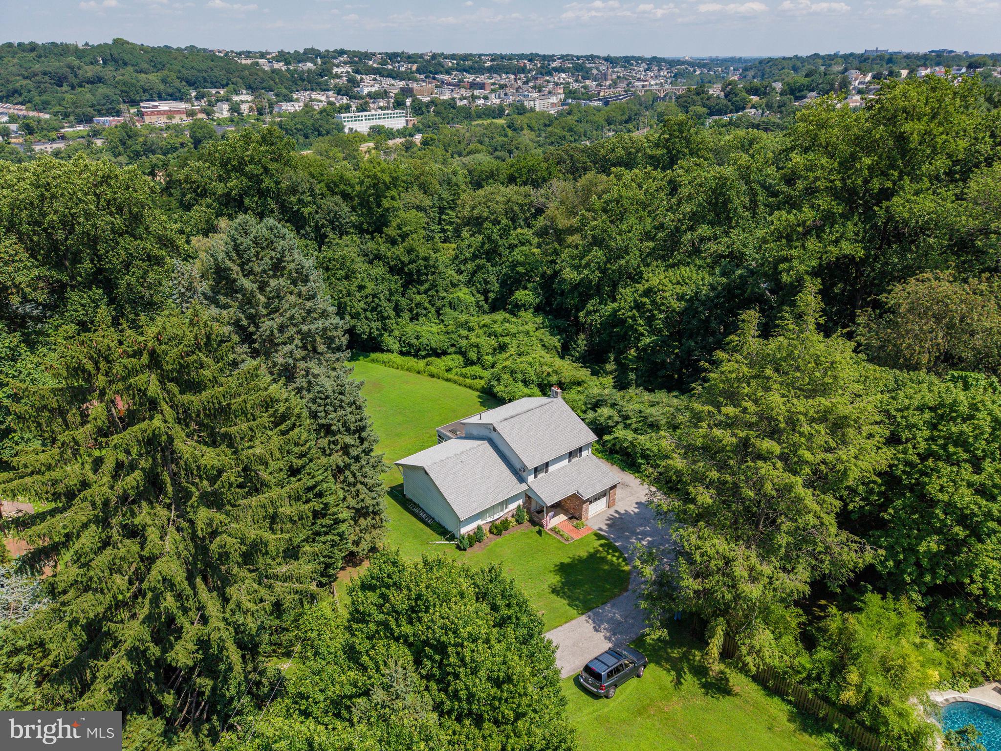 Extraordinary opportunity in a premier Penn Valley location. Charming brick split level, lovingly maintained by its original owners for 50+ years. Flag lot w/ mature perimeter landscape offers privacy in a neighborhood setting and, at almost one acre, infinite possibilities. The current footprint offers a solid foundation with generous proportions and a layout that invites creativity. Live in the house exactly as is, renovate and/or build an addition, or create a custom architectural masterpiece from the ground up.  Award winning Lower Merion public schools and close proximity to the best lifestyle destinations on the Main Line.