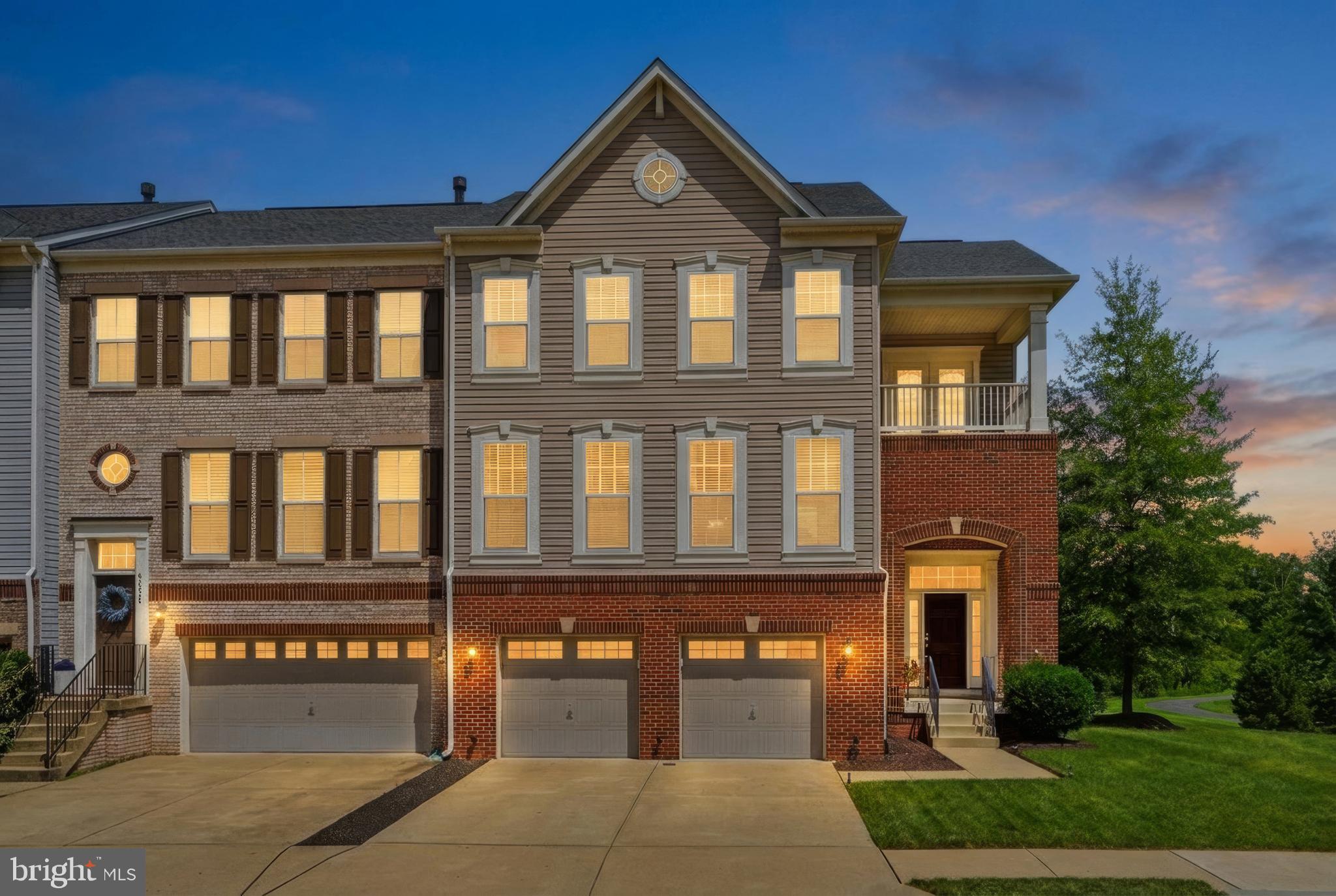 WELCOME HOME to one of the most desirable floor plans in The Village at Belmont Ridge! This rarely available Barclay Model by Ryland Homes offers the perfect blend of townhome convenience with the spacious feel and functionality of a detached home. Nestled on a premium end-unit lot, this exceptional residence is flooded with natural light from additional windows while offering enhanced privacy and tranquil wooded views.Outdoor living reaches a whole new level with 3 extraordinary spaces designed for year-round enjoyment. Relax on the private Trex deck backing to mature trees, entertain guests on the expansive ground-level Patio—remarkably larger than many detached homes’ backyards—with a combination of elegant stamped concrete and lush green space, or retreat to your own covered Romeo & Juliet Balcony off the luxurious Owner’s Suite, where peaceful mornings begin with coffee and evenings end with a glass of wine.One of this home’s most sought-after features is its multigenerational-friendly floor plan—a rarity among townhomes. Just a few steps from the foyer, you’ll discover an oversized recreation room complete with a stylish wet bar, a legal 4th bedroom, a full bath, and direct walkout access to the private patio, creating the perfect guest suite, in-law retreat, home office, or entertainment space.The heart of the home is the stunning Chef’s Kitchen, thoughtfully designed for both everyday living and effortless entertaining. It showcases an oversized center island with breakfast bar seating, gleaming granite countertops, stainless steel appliances, a 5-burner gas cooktop, heavy-duty exhaust hood, abundant cabinetry, and durable engineered hardwood flooring. Large patio doors seamlessly connect the kitchen to the serene Trex deck, inviting you to enjoy outdoor dinners, weekend brunches, or peaceful mornings surrounded by nature.Adjacent to the kitchen, the bright and inviting Family Room features a cozy gas fireplace, creating the perfect gathering space. A separate wing offers elegant formal living and formal dining rooms, providing flexibility for entertaining on any scale while maintaining an open yet sophisticated layout.Upstairs, the impressive Owner’s Suite is truly a private sanctuary. Spacious and refined, it features a tray ceiling, two oversized custom-organized closets, a luxurious spa-inspired 5-piece bath with upscale finishes, dual vanities, a soaking tub, separate shower, and a window overlooking the woods. Best of all, step directly onto your private covered balcony to enjoy quiet moments in complete serenity.The upper level also includes 2 generously sized secondary bedrooms, a spacious hall bath, and a thoughtfully designed laundry room equipped with a Samsung washer and dryer, extensive built-in cabinetry, and abundant shelving for exceptional storage and organization.Not an inch of carpet can be found throughout the home. Every level features beautiful engineered hardwood or premium luxury vinyl plank flooring, offering timeless elegance, easy maintenance, and an excellent environment for allergy sufferers.Located within the highly acclaimed Top-Rated Briar Woods High School Pyramid, this home offers an exceptional lifestyle with a low HOA fee.Residents enjoy an unbeatable location just minutes from Brambleton Town Center, featuring restaurants, cafés, boutique shopping, a movie theater, grocery stores, fitness centers, and the vibrant new recreation pavilion. Major commuter routes, the Dulles Greenway, Route 50, Route 28, Silver Line Metro, and Dulles International Airport are all conveniently nearby, making daily commuting remarkably easy.Homes like this rarely become available. Experience the space, elegance, privacy, and unique lifestyle the Barclay Model offers. Schedule your private tour today and discover why this extraordinary home is the one you’ve been waiting for.