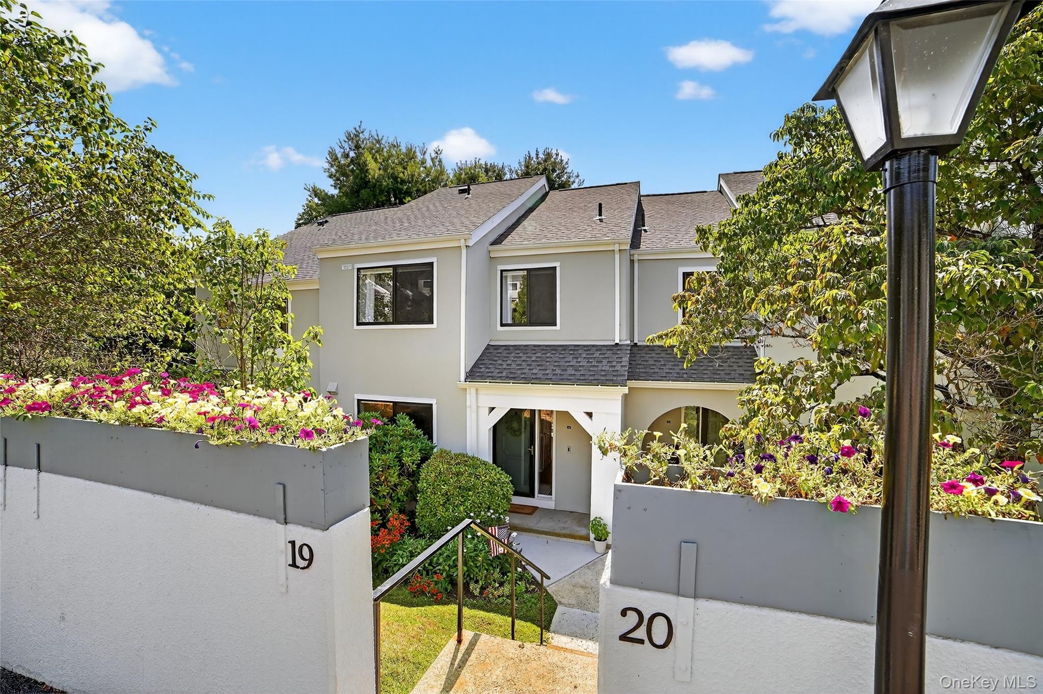 This beautiful townhouse offers a unique opportunity to experience the best of Katonah living, combining comfortable elegance with a prime location to the center of town with restaurants, recreational parks, public library and the train.

 Your private entrance leads to the eat-in-kitchen, powder room and the dining room which overlook the spacious living room below with vaulted ceiling and sliders out to a private garden space. Down a few steps from the living room and you have a finished basement with beautiful built-in storage cabinets. Up a level from the entry, you will find a new full-sized washer and dryer, a hall bath with double vanity, an oversized 2nd bedroom and a large primary suite with custom closets and a stunning white marble bathroom. Additional 325 sq. ft. in basement is not included in total sq. ft. 

The many improvements to the complex include a new roof, gutters and downspouts, new vinyl fencing and exterior painting all completed in the summer of 2023. Sellers have paid up the assessment, so new owners will have peace of mind that improvements have been made without the added monthly expense!

Directly across the street from the complex is Rasor Field with access to a walking path that leads to Katonah Memorial Park. Once at Katonah Memorial Park you can enjoy the tennis courts, racket courts, ball field, picnic tables, restrooms and the wonderful outdoor swimming pool.