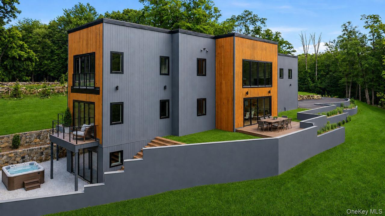 Modern Vision for Classic Suburban Living 41 Mead Road is an exceptionally custom-built residence that blends architectural sophistication with serene natural beauty. Sitting on 3.98 acres with a total interior area of 10,824 square feet with expansive open-concept living areas designed for modern luxury living. Offering 6 generously sized bedrooms and 7 full bathrooms with 2 additional half baths, thoughtfully designed for everyday comfort and entertainment.  Surrounded by lush greenery, the floor to ceiling windows seamlessly blend indoor and outdoor living showcasing abundant natural light and serene views throughout. Features include plentiful storage throughout, including a well-appointed mudroom designed for effortless everyday functionality and organization. Beautiful office space with a balcony overlooking nature. Additional convertible spaces provide exceptional flexibility for customized lifestyle and entertainment areas, with the potential for a private sauna, cinema, recreation lounge, wellness retreat, or expansive secondary living spaces. A unique opportunity exists to expand the outdoor entertaining space with a potential 3,500-square-foot rooftop deck. Additional highlights include proximity to the Armonk town center and North Castle’s nature preserves, hiking trails, and golf courses. Convenient access to White Plains, Greenwich, and NYC makes this home a rare offering in one of Westchester’s most sought-after communities.Some Pictures are Virtually Staged