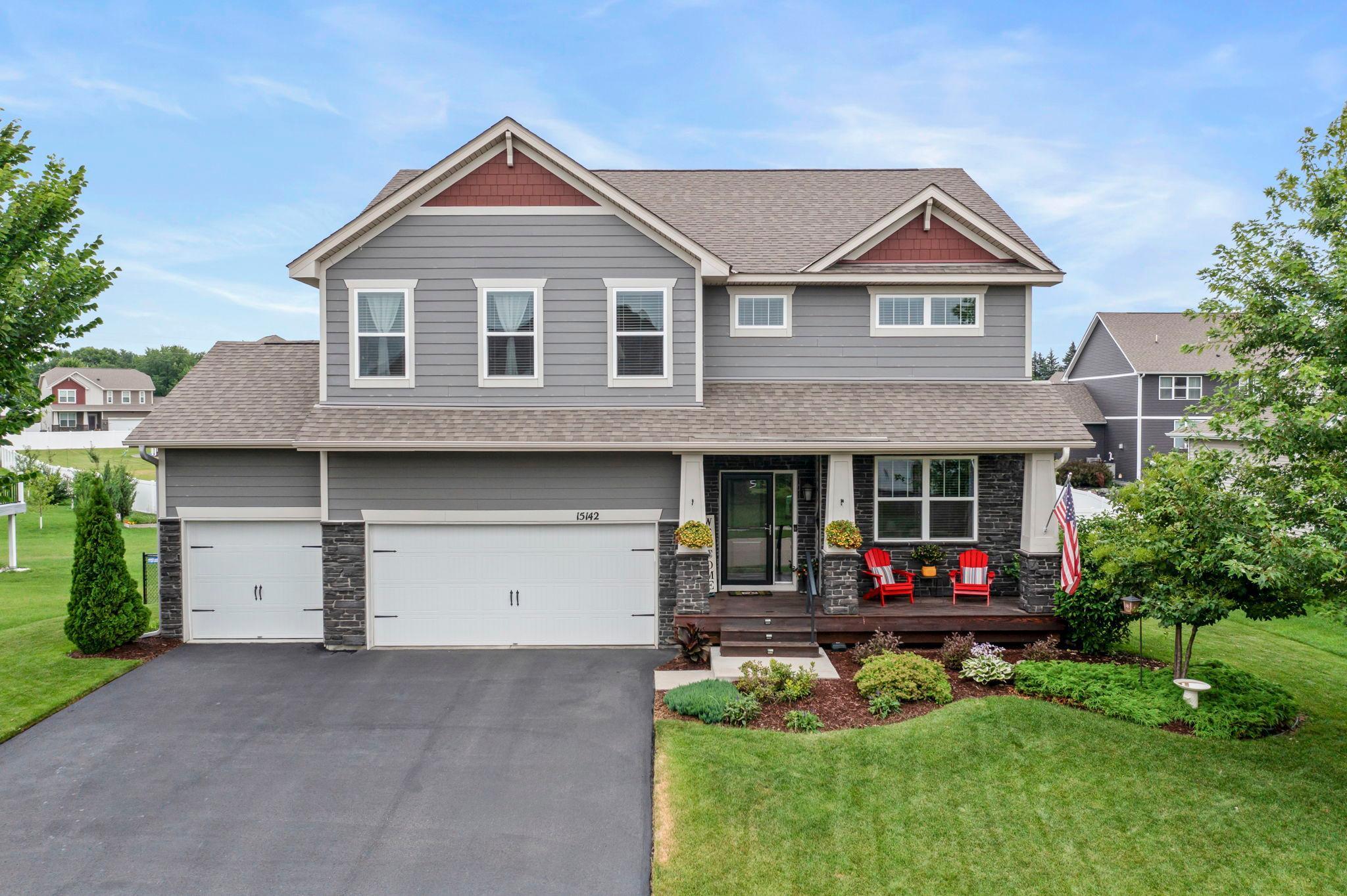 This stunning 4-bedroom, 3-bathroom turnkey home sits on a spacious lot in a quiet Apple Valley neighborhood featuring a shared community pool, nearby park, and walking trails—just minutes from restaurants, shops, and downtown Apple Valley with easy access to Hwy 77 and 35E. Dream kitchen with white cabinetry, granite countertops, large center island with pendant lighting, gas cooktop, double oven, and a walk-in pantry. The kitchen flows into the dining area with walkout access to a maintenance-free deck overlooking the fully fenced backyard—perfect for entertaining. The main level also features a light-filled living room with gas fireplace, a private office/den, half bath, and access to the attached 3-car garage. Upstairs offers four bedrooms on one level, including a spacious primary suite with a 12x10 walk-in closet and private ensuite with dual sinks, soaking tub, walk-in shower, and separate water closet. A full bathroom and convenient upper-level laundry add functionality. The spacious loft features a wood-paneled accent wall and recessed lighting, making it an ideal flex space for a second living area, media room, playroom, or home office. The newly finished lower level includes a family room with lookout windows and additional storage. Numerous updates include new carpet, Trex deck, backyard fence, updated lighting, HVAC servicing, duct cleaning, and more. Move-in ready in a fantastic location.