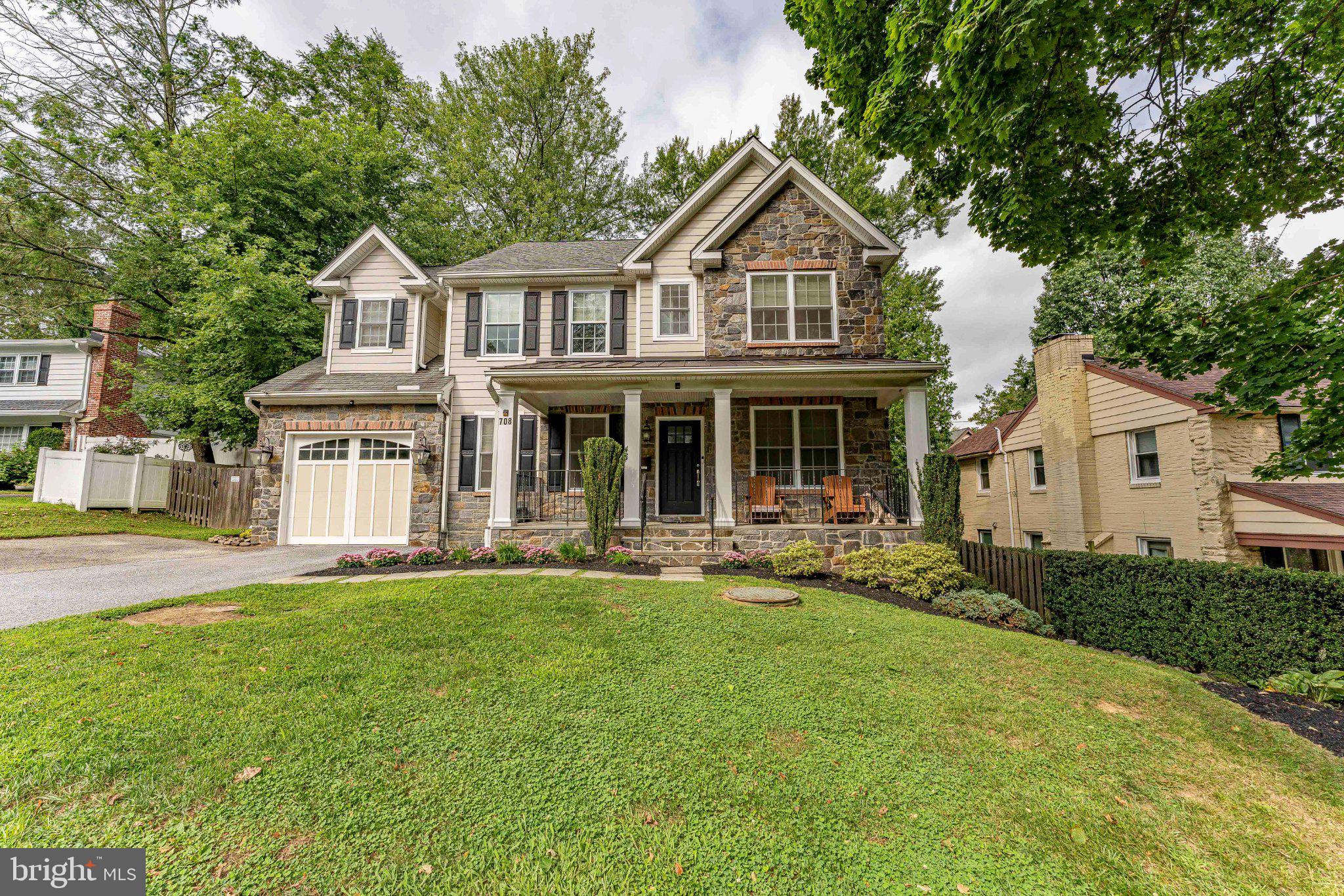 Welcome to 708 Harvard Road, a beautifully appointed 5-bedroom, 3.5-bathroom single family home. Located in the highly sought-after, award-winning Lower Merion School District, this home offers an exceptional Bala Cynwyd location with access to one of the area’s most desirable school systems. Built in 2016, this home offers a spacious, functional layout with thoughtful upgrades throughout. Featuring a stone and siding exterior, welcoming front porch, fenced yard, rear patio, finished basement, garage, and driveway parking, this home blends modern comfort with everyday convenience in a highly desirable location. Inside, the main level offers hardwood flooring, detailed trim work, and a natural flow between the living spaces. To the right, the living room features hardwood floors, crown molding, chair rail, wainscoting, and recessed lighting. To the left, the dining room continues with hardwood flooring, crown molding, chair rail, and wainscoting, creating an elegant setting for everyday meals or entertaining. The kitchen is designed for both cooking and gathering, featuring hardwood flooring, an island with seating, pendant lighting, stainless steel appliances, gas cooktop, double wall oven, range hood, pot filler, dishwasher, disposal, refrigerator, and a butler’s pantry flows into the dining room. The kitchen opens to the family room, where hardwood floors, recessed lighting, chair rail, wainscoting, a coffered ceiling, and gas fireplace create a warm and inviting space to relax. A mudroom off the kitchen, private study with hardwood floors, crown molding, and ceiling fan, plus a convenient powder room complete the main level. Upstairs, the primary bedroom offers a comfortable retreat with wall-to-wall carpeting, tray ceiling, recessed lighting, ceiling fan, and two walk-in closets with custom closet systems. The spacious primary bathroom features tile flooring, double vanity, soaking tub, walk-in shower, vaulted ceiling, and an upgraded Toto bidet with heated seat. Three additional bedrooms provide comfortable space for family, guests, or a home office, including one with walk-in closets. A full hall bathroom with tile flooring, double sinks, and a tub/shower combination serves these bedrooms. The upper level also includes a laundry room with tile flooring and attic access. The finished basement adds valuable living space with a large game room featuring wall-to-wall carpeting and recessed lighting, a fifth bedroom with an egress window, a hobby room, and a full bathroom with tile flooring and shower. The lower level also includes an active radon system, sump pump, 200 amp service, gas HVAC, and PEX plumbing. The current owners have made several thoughtful improvements, including a custom closet system in the primary closets, an extended driveway with parking for two cars, an EV charger, garage ceiling storage with hoist, smart MyQ garage opener, electrical upgrades, smart HUE LED color flood lights, and smart lights in nearly every room. The fenced backyard includes a patio, swing set, artificial grass play area, and two storage sheds. Conveniently located near local shopping, grocery stores, restaurants, parks, and everyday amenities, this home also offers easy access to I-76 for commuting throughout the Main Line, Center City, and surrounding areas. Don’t miss the opportunity to make 708 Harvard Road your next home.