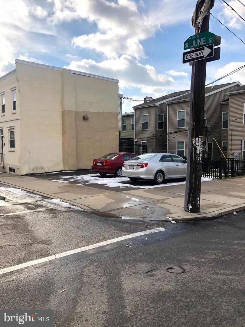 15.33 Ft X 40 Ft True Corner Lot. Currently paved and used as off-street parking. Taxes are $18 per year. The zoning is CMX2.  BRAND NEW PERMIETER FENCE On the same block as the Philadelphia Housing Authorities development, newer construction homes. There are also a number of new construction projects underway and in planning stages in the immediate area. Give me a call today to make a deal. Buyer is responsible for obtaining a clear U&O.