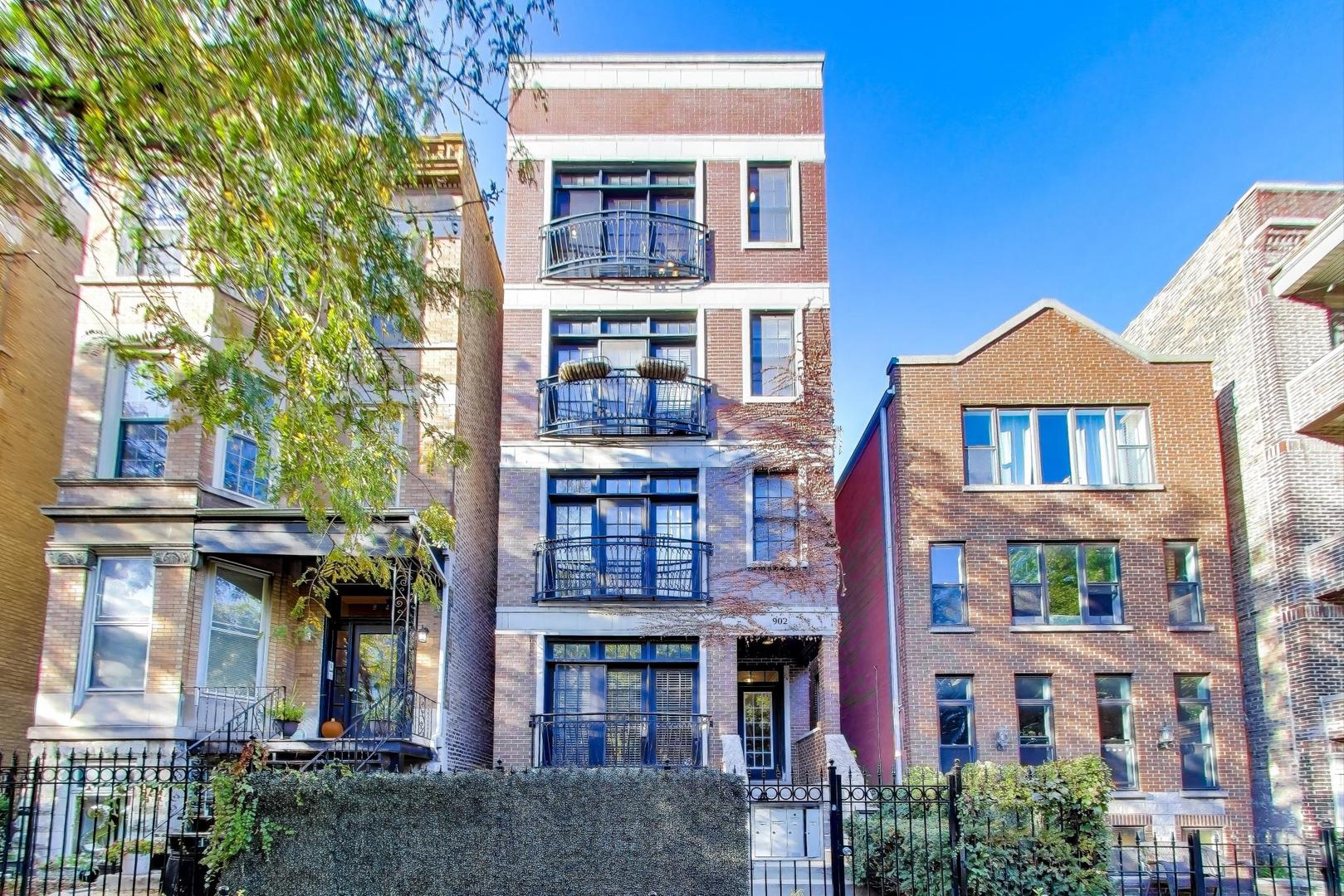Beautiful Penthouse Condo with Private Rooftop Deck! Move-in-ready top floor condo featuring an oversized chef's kitchen with plentiful cabinets and counter space plus a breakfast bar, wine fridge and high-end appliances including Sub-Zero refrigerator, Viking Range and Hood, and Bosch dishwasher. Perfect for entertaining, the home includes two wet bars - one that opens out to a private rooftop deck with incredible 360-degree views of the city. The spacious primary suite accommodates a king-size bed, has a large private balcony and walk-in closet. The en-suite primary bathroom includes a steam shower, soaking tub, heated floors and expansive dual vanity. The condo has been freshly painted and has newly refinished hardwood floors throughout. One attached garage parking space is included in the price. Other highlights include a south-facing Juliet balcony in the living room, crown moldings, gas fireplace, surround sound and storage.
