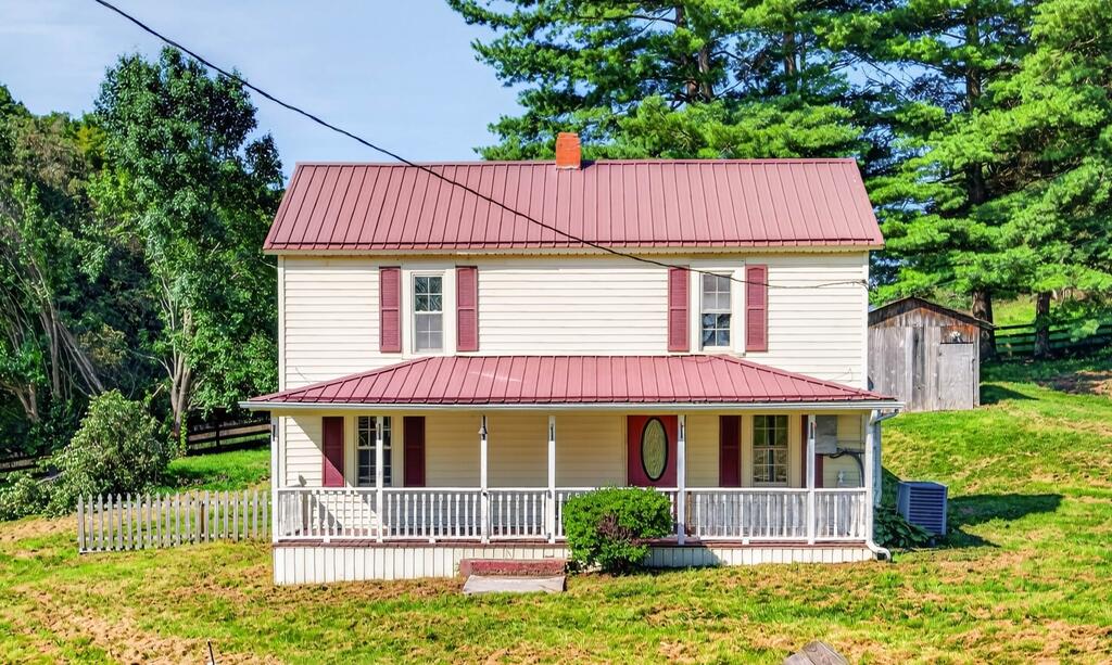This classic farmhouse is packed with charm and offers that peaceful country feel without the upkeep of a large property. Sitting on a level, manageable lot, it's the perfect opportunity to bring your ideas and personal touches to life.  Plus, a detached two-car garage provides plenty of space for vehicles, storage, a workshop, or all those country-living extras. Whether you're looking for a cozy place to call home, a weekend retreat, or an investment opportunity, this farmhouse is ready for its next chapter!