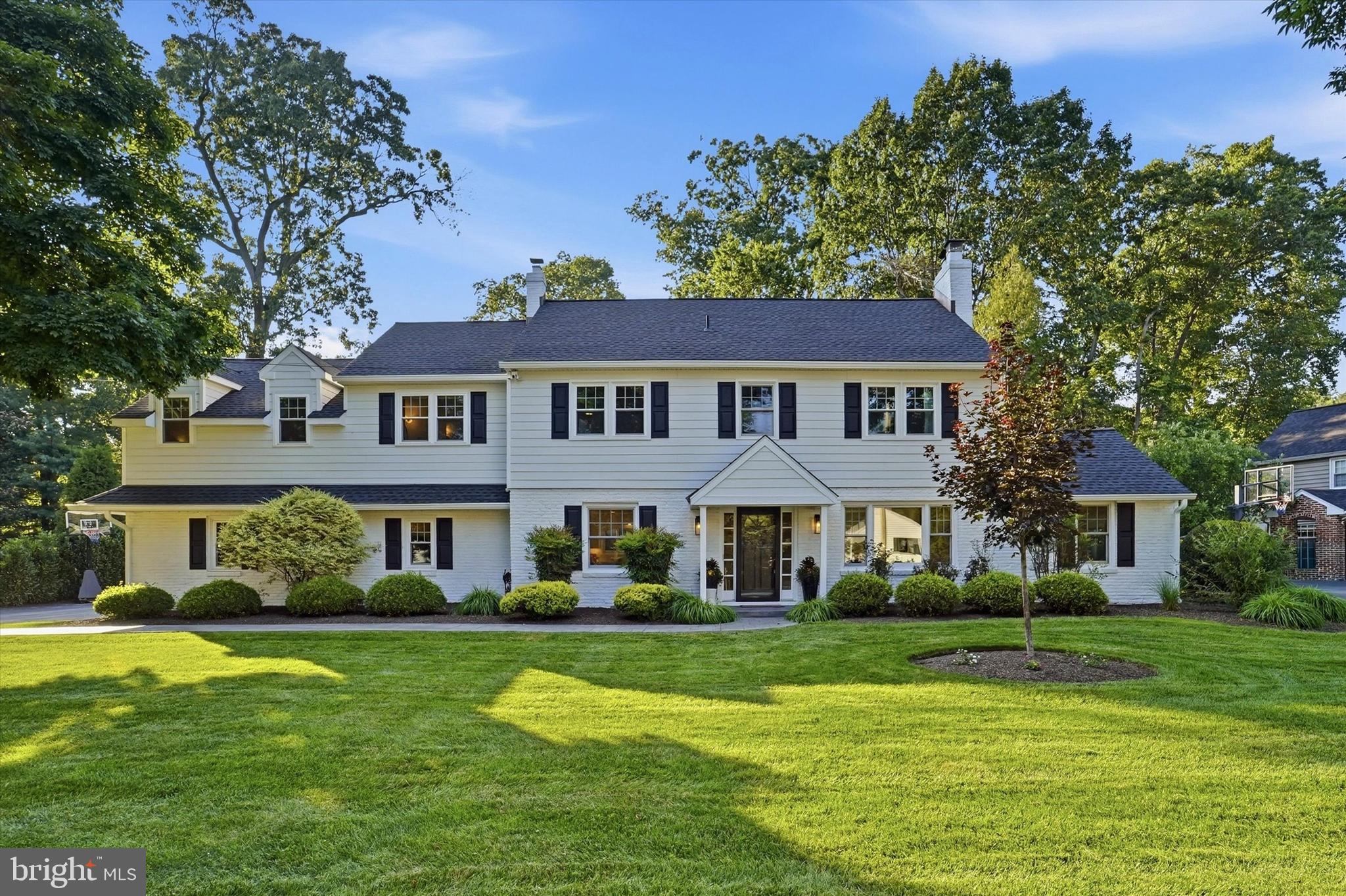 Welcome to 417 Heatherwood Lane—a beautifully updated Devon residence where timeless sophistication meets modern convenience. Set on a picturesque, tree-lined street in the highly sought-after Tredyffrin-Easttown School District, this exceptional 4-bedroom, 3 full and 1 half bath home offers refined living spaces, thoughtful updates, and outstanding curb appeal.From the moment you arrive, you’ll be captivated by the gorgeous manicured landscaping, mature trees, and Brick/Hardie® Board siding, creating a warm first impression. Inside, stunning wide-plank white oak flooring, abundant natural light, and modern millwork create an atmosphere of grace, sophistication, and timeless style.Designed for both everyday living and effortless entertaining, the beautifully renovated eat-in kitchen features quality finishes, quartz countertops, abundant inset cabinetry, and combined seamlessly with the dining room, creating an inviting space for family and friend gatherings. The spacious family room features a cozy fireplace, while the office/bonus room offers a versatile retreat with its own fireplace and sliding glass door that open to the patio—perfect for a home office, playroom, reading space, or additional entertaining area.The beautifully renovated mudroom and laundry room has been thoughtfully updated with designer tile flooring, custom built-ins, a coffee station, honed granite, beverage refrigerator, and storage—bringing functionality to everyday living.The exceptional primary suite is a true private retreat, featuring a spacious sitting room, dedicated additional laundry area, generous walk-in closets, and a spa-inspired en-suite bath. The luxurious bath showcases quartz countertops, dual vanity, large-format tile, a freestanding soaking tub, and a beautifully tiled walk-in shower. Two additional bedrooms, 1 hall bath, and another ensuite bedroom provide exceptional comfort and flexibility for family and guests. A Cedar closet in the floored attic (with new attic door/ladder) provides extra storage. A beautifully maintained home with recently replaced windows throughout the house and asphalt roof (2019) with transferable 20 year GAF warranty offer a piece of mind to the most discerning buyer.An attached two-car garage with an updated garage door opener adds additional functionality and ease.Outside, privacy, manicured landscaping, newer hardscaping and fenced in backyard create the perfect setting for relaxing or enjoying the beauty of every season. Perfectly positioned just minutes from downtown Wayne, Devon Yard, the Devon Horse Show Grounds, premier shopping and dining, SEPTA Regional Rail, and major commuter routes, 417 Heatherwood Lane offers an exceptional blend of modern updates, comfort, and convenience.