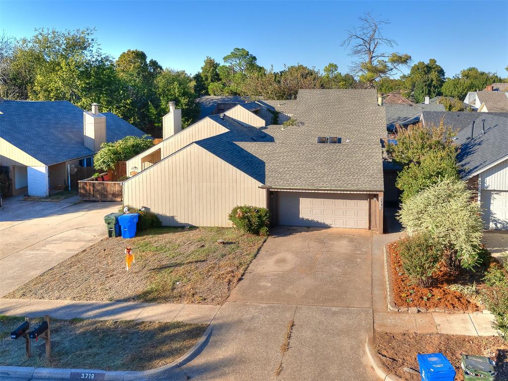Discover this inviting 3-bedroom, 2-bathroom half duplex in West Norman, offering 1,766 square feet of comfortable living space and a 2-car garage. The home features an open floorplan with plenty of windows that fill the interior with natural light. The spacious living and dining areas connect seamlessly to the kitchen, creating an easy flow that’s great for both everyday living and entertaining. The kitchen includes white cabinetry, a modern tile backsplash, and stainless steel appliances, giving the space a clean and updated look. Wood laminate flooring extends through all high-traffic areas, providing durability and easy maintenance, while fresh new carpet adds warmth and comfort to the bedrooms. The downstairs suite offers generous space and includes an attached patio room—a flexible area that can serve as a reading nook, workout space, or home office—with direct access to the backyard. The two additional bedrooms share a well-appointed second bathroom, offering plenty of room for guests or a growing household.  Outside, enjoy a private backyard space that’s ready for your personal touch. Located in a desirable area of West Norman, this home offers convenient access to shopping, dining, parks, and highly rated schools. With its spacious layout and light-filled design, this property is an excellent opportunity to make a comfortable home in a great location.