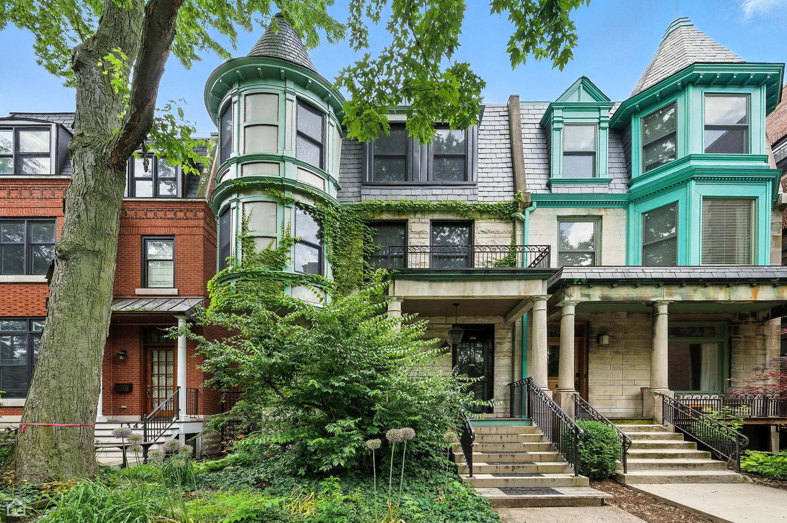 The historic greystone homes that line the north side of the highly desirable Madison Park community are truly special and seldom come on the market.  The listing of this stately property therefore represents a rare opportunity for a discerning buyer seeking a gracious 4-bedroom, 3.5-bath home with garage parking in that very special location.  The rooms are all spacious and retain many original architectural details including high ceilings, beautiful crown moldings, and hardwood floors throughout.  The eat-in kitchen has been thoroughly renovated with high-end stainless appliances.  Bathrooms have likewise all been brought up to date.  Mini-split a/c units are in all of the major rooms.  Almost all windows have been replaced.  The large open basement is currently unfinished, but is ready for renovation if desired.  A charming private backyard with a two-car garage completes the property.  Though located in a quiet park-like setting on a tree-lined street with little thru traffic, Lake Shore Drive access, the Metra station, and downtown bus stops are just a short distance away.