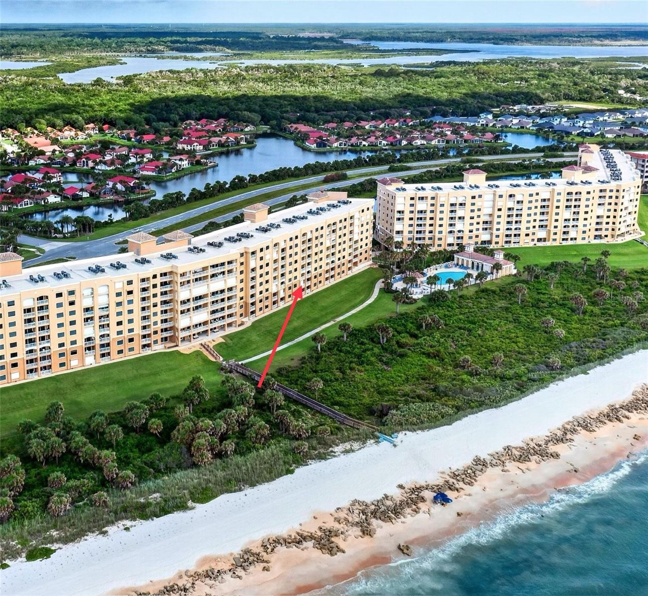 This 3 bed 2-1/2 bath condo in Surf Club III is in excellent move in condition.  Popular 1,640 sqft Captiva model with upgrades makes this a desirable unit. Only one owner.  Tile plank floors in all living areas, operable single hung impact glass window in primary bedroom allows you to open and hear the waves and feel ocean breezes. Primary bedroom has its own en-suite bath, walk-in closet and ocean views.  Great room has large impact sliding glass doors leading to balcony with ocean views for awesome sunrises.  Kitchen upgrades include new cabinet door fronts, pullouts, improved non wire shelving, and more.  42" cabinets, an eat at bar with granite countertops make this a comfortable, functional kitchen.  Newer appliances include fridge, dishwasher, washer and dryer.  Both guest bedrooms are large and comfortable. 2  covered garage parking spaces and a storage unit included.  Relax on the ocean view deck.  Surf Club is a unique complex with fantastic amenities.  It is located directly on the ocean but with Intra-coastal access as well.  Take the boardwalk to the beach and you might have sea turtles swimming in the rock formations. Soft sand to stroll or relax in the sun.  This pet friendly beach allows you to walk your dogs on the uncrowded beach.  Swim in any of the any of the 3 pools, or use the fitness center.  Take your bike or bring a kayak and head to the Intra-coastal clubhouse and dock for sunsets.  Enjoy miles of salt flats to fish and explore by kayak.  Walk on the miles of trails in the preserved wooded area.  Located in North Flagler County you are close to St. Augustine and exciting Daytona.  Nearby is convenient shopping at Publix, dining, boat ramps, miles of bike and walking trails, and of course the beach.  Condo fees include Wind and Flood insurance, Pest Control, 24 hr gate, Cable, High Speed Internet, Water, 3 Pools, Tennis and Pickle Ball courts, Volley ball courts, Shuffle ball, several clubhouses, Fitness Center,  Walking Trails, Library, Covered Garage Parking,  Day Dock at ICW, and much more.