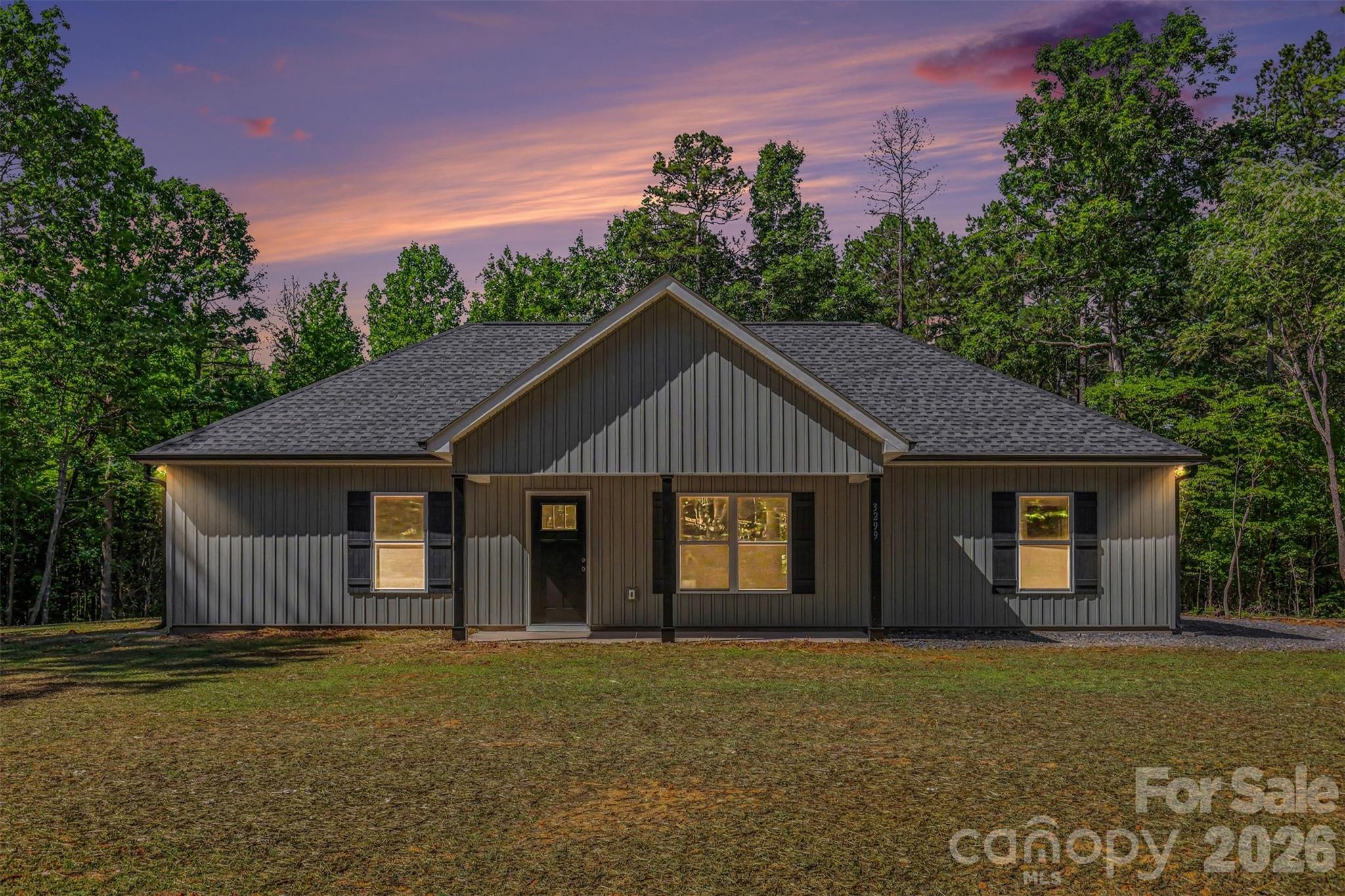 Love country living? You'll fall in love with this beautiful new construction home in Smyrna, nestled on just under an acre of land. This thoughtfully designed 3-bedroom, 2-bath home offers an inviting open-concept floor plan with gorgeous, durable luxury vinyl plank (LVP) flooring throughout and neutral alabaster walls that create a bright, modern feel. The kitchen is both stylish and functional, featuring beautiful cabinetry, granite countertops, and ample space for cooking and gathering. Both bathrooms are finished with the same quality craftsmanship and elegant granite surfaces. The spacious primary suite provides a private retreat complete with tray ceilings and its own en-suite bath, offering comfort and convenience. Step outside and enjoy the covered front porch and rear patio—perfect for sipping your morning coffee, relaxing after a long day, or entertaining family and friends. With peaceful country surroundings, modern finishes, and nearly an acre of property to enjoy, this move-in-ready home offers the perfect blend of comfort, style, and space.