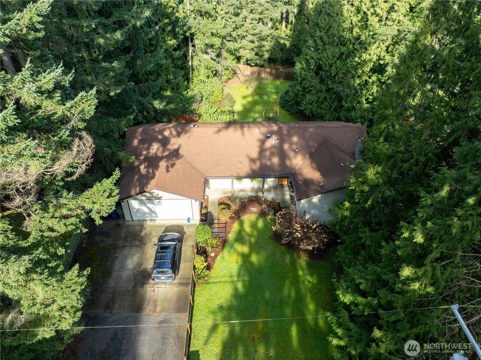 Discover a prime estate or development opportunity in the highly sought after North Creek area of Snohomish County. This 4,441 sq ft daylight rambler sits on an expansive 49,223 sq ft corner lot, offering exceptional potential for builders, investors, or those seeking a signature estate property. With LDMR zoning and surrounding redevelopment activity, early feasibility suggests the site may support up to 12 single family homes or approximately 18 townhome lots (buyer to verify). Adjacent parcels are already under contract for redevelopment, and nearby luxury townhome communities—featuring units selling above $1M—underscore the strong demand and proven market performance in this corridor. The existing home is well designed and positioned for those who may wish to modernize and enjoy a private estate setting, while the land itself presents a strategic opportunity for future density. Located minutes from Canyon Park, I 405, Woodinville, and North Creek, this property offers convenience, growth potential, and long term value. Sellers are open to favorable developer terms or extended timelines, making this an exceptional chance to secure a prime site in a thriving Bothell location.