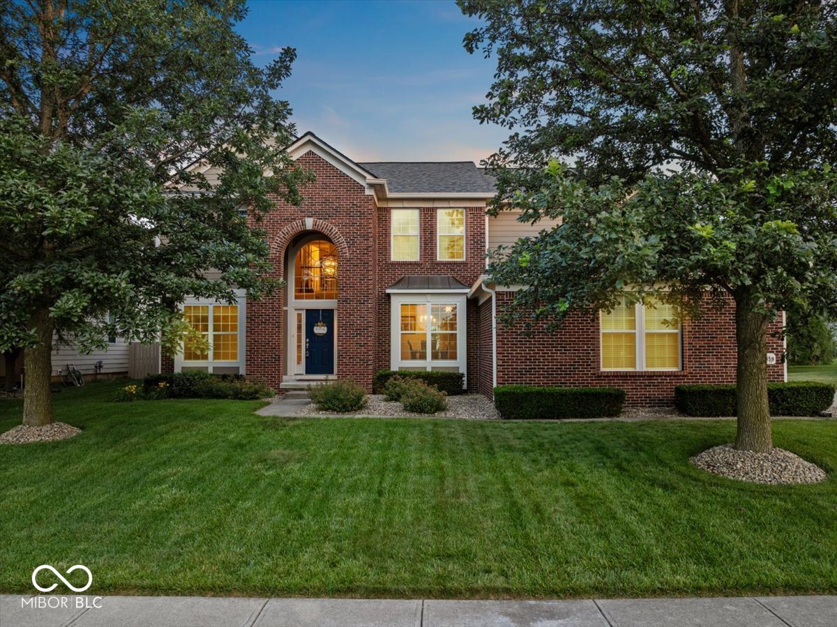 Brand new to the market, located in the premiere Fishers' golf community, Gray Eagle. This one-owner home has been wonderfully taken care of, and is in absolute move-in condition ready for its new owners. Main level is highlighted by 9 foot ceilings, a private Office with French doors, gleaming real hardwood floors, stainless appliances, tile backsplash, newer paint/carpet. Upstairs you will find a secluded primary bedroom retreat with a vaulted ceiling, a wall of windows overlooking the backyard, large walk-in closet, stand-up shower & garden tub. 4 additional bedrooms up, with one of them currently used as a bonus room, but it has a closet if you need a 5th BRM. Full basement includes 9 foot ceiling, egress & daylight windows, full bath rough-in. The outdoor living space is sure to impress with a covered, stamped concrete patio perfect for entertaining or relaxing. It will become your favorite spot in this home!