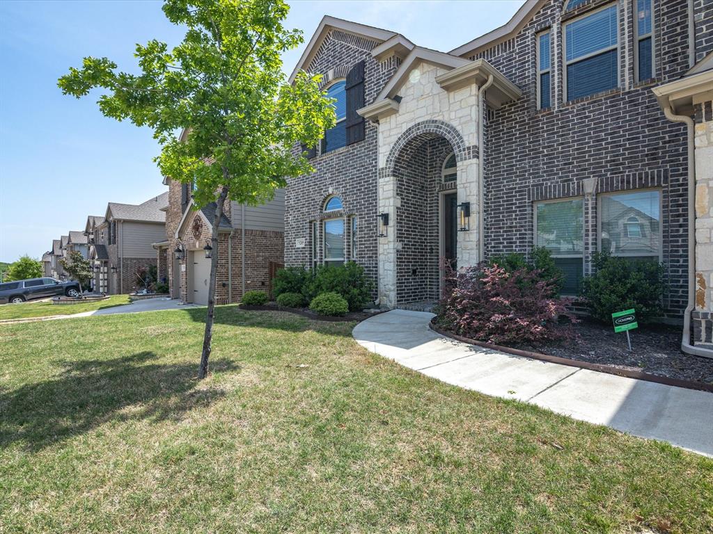 Welcome to this well maintained charming home located in the highly sought-after Marine Creek Ranch community. This spacious 5-bedroom, 3.5-bathroom home offers 3399 sq ft of thoughtfully designed living space. The open-concept floor plan effortlessly blends the kitchen, dining, and living areas, making it ideal for both everyday living and entertaining guests. With ample room for all your storage and organization needs, this home features a custom, extended-length garage, three attic accesses, an extra-large covered porch, and generous walk-in closets throughout. Inside, the living area is highlighted by a cozy gas fireplace and ceiling fans in every room to provide year-round comfort. High ceilings and expansive windows allow natural light to flood the space, creating a bright and welcoming atmosphere. The kitchen is a chef’s dream, complete with granite countertops, an oversized island, double ovens, and a walk-in pantry. The private primary bedroom, located on the first floor, offers a peaceful retreat. Upstairs, you’ll find a versatile flex space, perfect for a playroom, second living area, or home gym. This home also includes a dedicated office, which can be used for work or converted into additional flex space, depending on your needs. Whether you require a quiet space for productivity or a multi-purpose room, this area offers endless possibilities for customization. Situated within walking distance of the lake, community pool, and a brand-new park, this home enjoys a prime location with easy highway access. Just 10 minutes from downtown Fort Worth, you’ll have quick access to shopping, dining, and entertainment. Don’t miss your chance to own this stunning home in an unbeatable location. Schedule your private showing today!