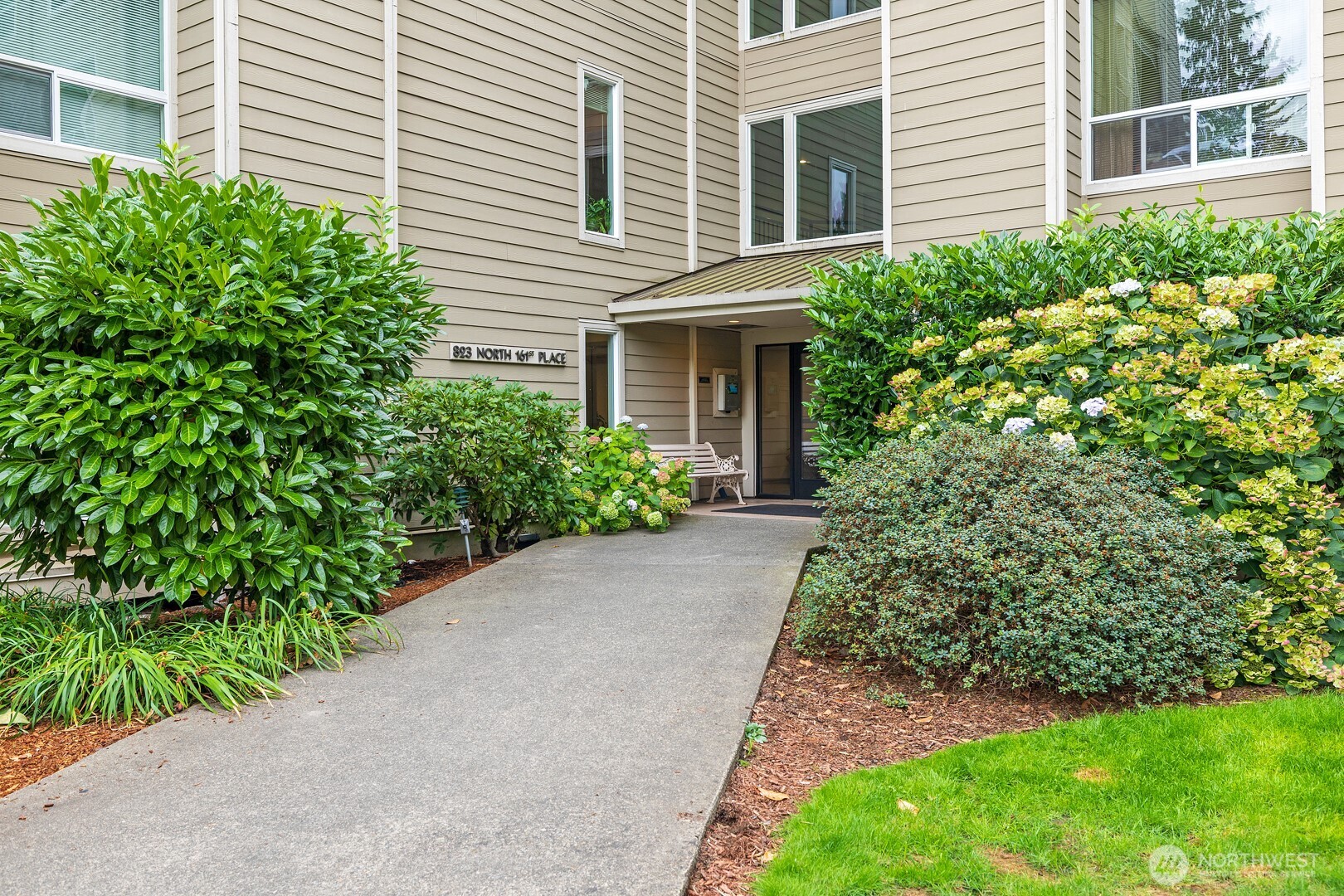 Peaceful, turnkey 2-bedroom, 1.75-bath condo perfectly placed in Forest Villa, a 7 acre retreat within minutes to light rail, Shoreline Comm. College, Town & Country and Shoreview Park! This property is so unique- serene and beautifully landscaped with an on-site walking trail around the landscaped grounds, an outdoor pool, sauna, hottub, raquetball court, gated entry and picnic space.  The unit itself is perfectly equipped with updated kitchen (tons of storage), in-unit washer & dryer, gas fireplace, balcony, large windows with tree views, a large primary bedroom with attached walk through closet and bathroom.  Separate second bedroom or office with a second bathroom.  Designated garage parking and dedicated storage locker for your gear. Commute via I5, 99, Interurban Trail or Link Light Rail! When you are done curling up by your fire, head out to the on-site amenities & walking trails, the interurban trail, or stroll to groceries, food, transit and schools/parks.