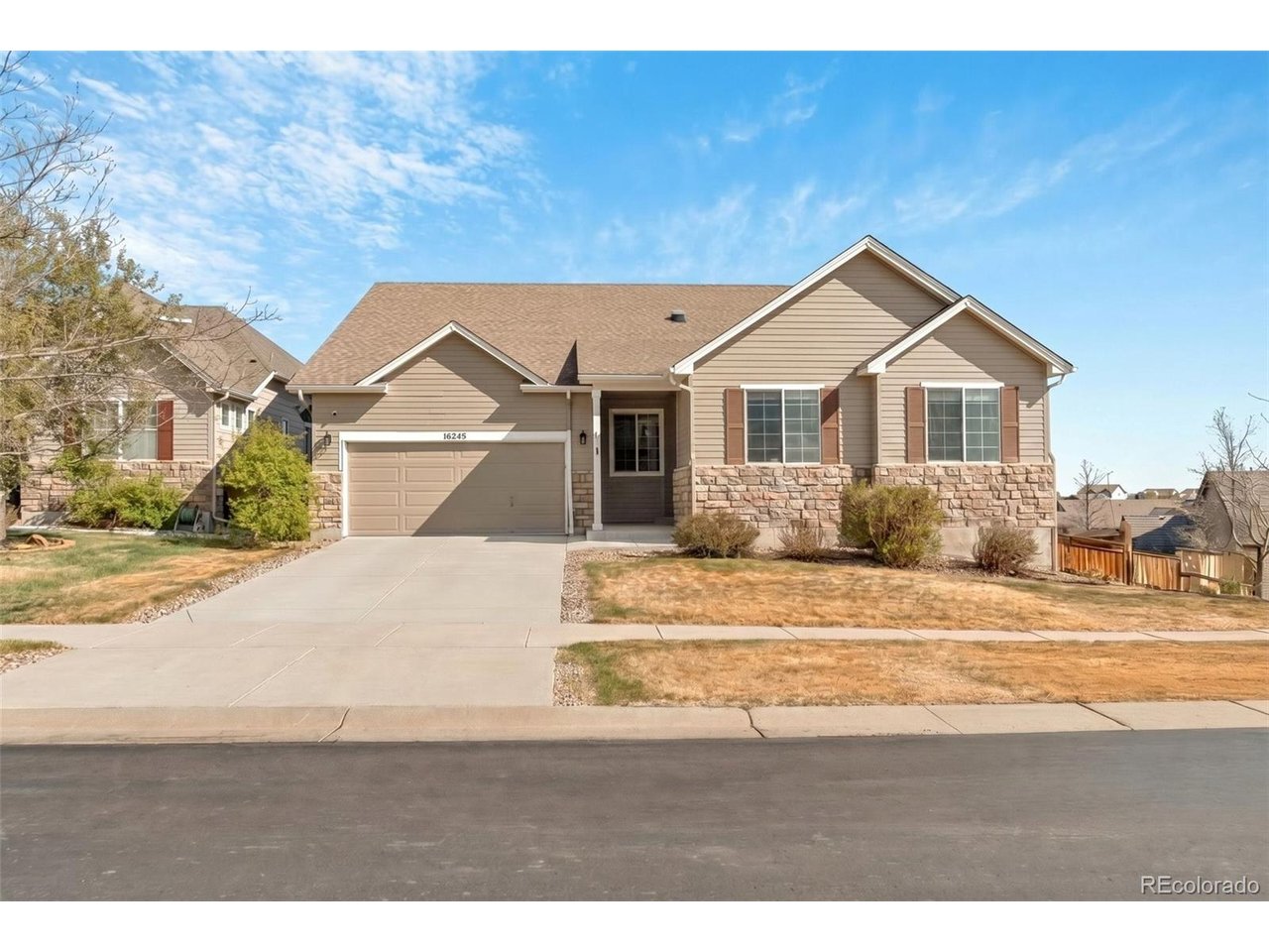 Located at 16245 Swift Fox Place, this ranch-style home puts you right where you want to be, close to Mainstreet Parker with easy access to restaurants, shopping, and local spots. The main level is set up with 3 bedrooms, 2.5 bathrooms, and an office, giving you some flexibility whether you need a work-from-home setup or just extra space. The layout is straightforward and comfortable, with the kitchen opening up to the living area so it all feels connected. The lower cabinets in the kitchen have pull-out shelves, which makes a big difference when it comes to storage and everyday use. The home sits on a corner lot and backs to an elementary school, which adds a level of convenience that's hard to beat. It's also in an area known for strong schools, making it a solid option for families. There's an unfinished basement that gives you room to expand down the road-whether you're thinking about adding more living space, a workout area, or just keeping it as extra storage for now. Parker as a whole is a great place to be. You've got a good mix of community feel and convenience, with parks, trails, and local events happening throughout the year, plus a downtown area that still feels like a true Main Street. If you're looking for a ranch home in a good location with a functional layout and room to grow, this one is definitely worth a look.