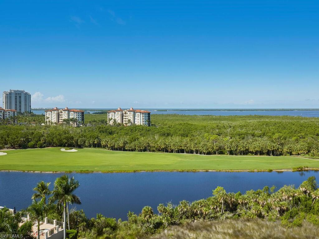 Enjoy breathtaking sunset views over Estero Bay and the Gulf of Mexico while sipping your evening cocktail from the spacious lanai of this ideal eighth-floor residence in Florencia at The Colony.On clear mornings, sip your first cup of coffee while taking in the serene beauty of the emerald green fairways of The Colony Golf Course.
Designed with a unique layout that lives like an end residence, this home welcomes you with a private elevator opening directly into the unit, where stunning views greet you the moment you arrive. The spacious floor plan offers flexibility for hosting guests or working from home, with the guest quarters thoughtfully separated from the primary suite.
Wake up each morning in the primary bedroom to panoramic vistas—and unwind in comfort knowing the suite features a handicap-accessible shower, blending luxury with convenience and thoughtful design.
Offered furnished with just a few exceptions, this home is move-in ready. Whether relaxing or entertaining, the oversized lanai provides the perfect backdrop for every occasion.Large laundry room with sink and storage. Your daily workout is a few flights down and a community room and movie theater offer a respite from the occasional afternoon rain! Take a swim in the resort-style pool, and offer overflow guests access to two guest suites. Leave for the summer, knowing you are secure with onsite management. Residents of The Colony enjoy a 34-acre beach park, tennis, pickleball, canoe, kayak, and a community fitness center, as well as The Bay Club, overlooking Estero Bay, offering an exceptional dining experience. The gated community of Pelican Landing including the Colony, has two elective golf club options. Close to dining, entertainment, and a short 20-minute drive to SWFL International Airport.